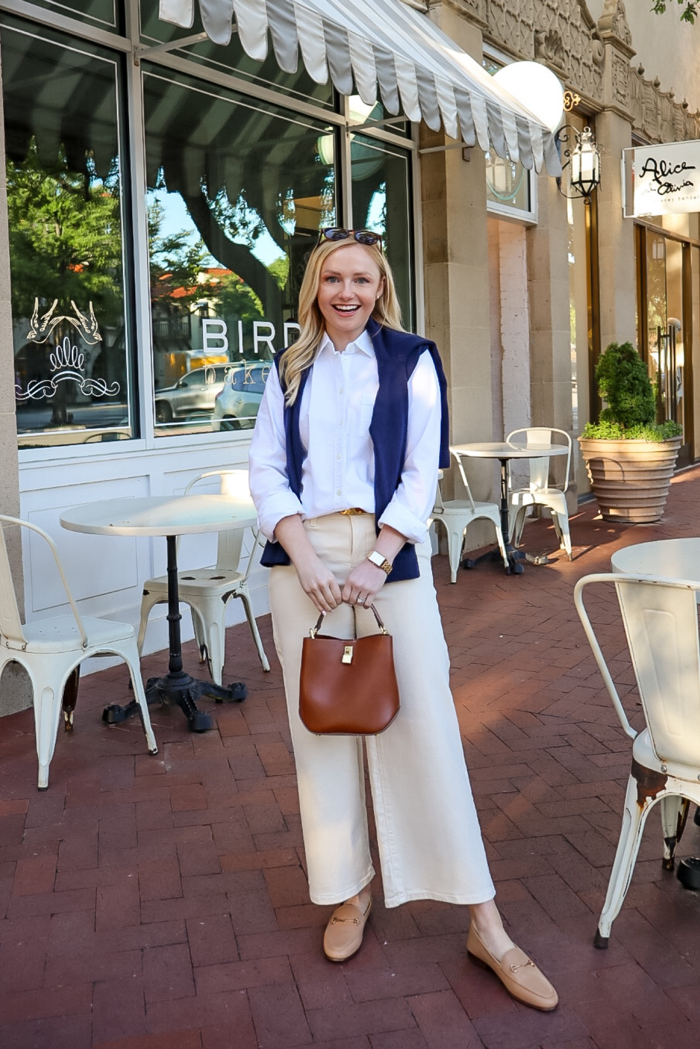 Preppy, casual spring outfit! I love these loafers. Wearing an XS in top, 2 in jeans, and true size 6 in loafers | wide leg jeans, off white jeans, oxford shirt, white button up, spring outfit 

#LTKSeasonal #LTKstyletip #LTKfindsunder100