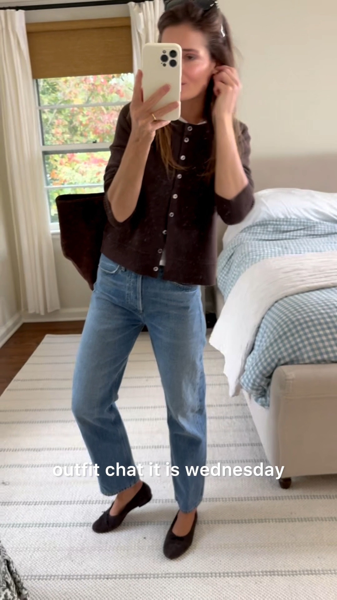 Outfit chat. One of the things that I love about this outfit is that while it is a pretty basic mom uniform and easy to pull together, it still looks super cute and polished. The 3 chocolate brown elements (Cardi, flats, and tote) do such a good job of creating a smart and cohesive look. I also think these Jeans are going to be at the very top of my rotation and best sellers. The fit is just a touch more relaxed than my other straight jeans I love and the vintage denim is next level. They are currently on sale at REVOLVE! 

Have a great Wednesday all! 🤍

#LTKStyleTip #LTKSaleAlert #LTKSeasonal