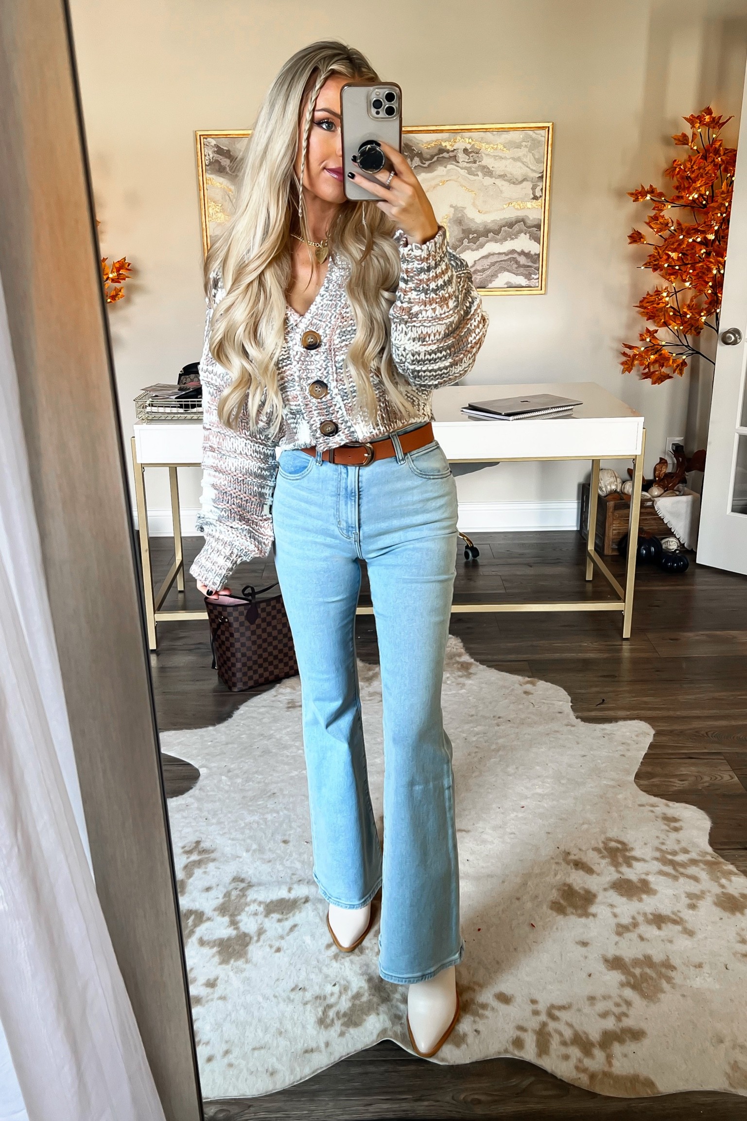 Flare jeans. Abercrombie flare jeans. Sweater. Cropped sweater. Winter outfit. White western boots. White cowboy boots  

#LTKSeasonal #LTKstyletip #LTKHoliday