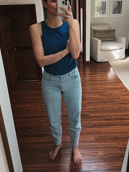 le mum trousers by sezane - light colored denim with a flattering fit. sized up one from my regular size. Everlane  cut away tank is my fav tank for spring and summer! I own 3! 



#LTKstyletip #LTKworkwear #LTKSeasonal