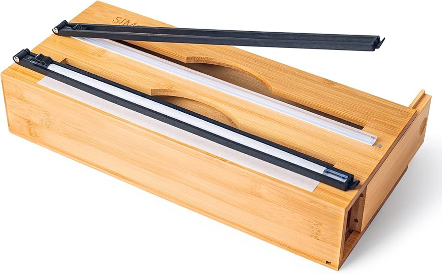 Foil and plastic Wrap Dispenser with Cutter, 2 in 1 Wrap Dispenser, Parchment, Wax Paper and Alum... | Amazon (US)