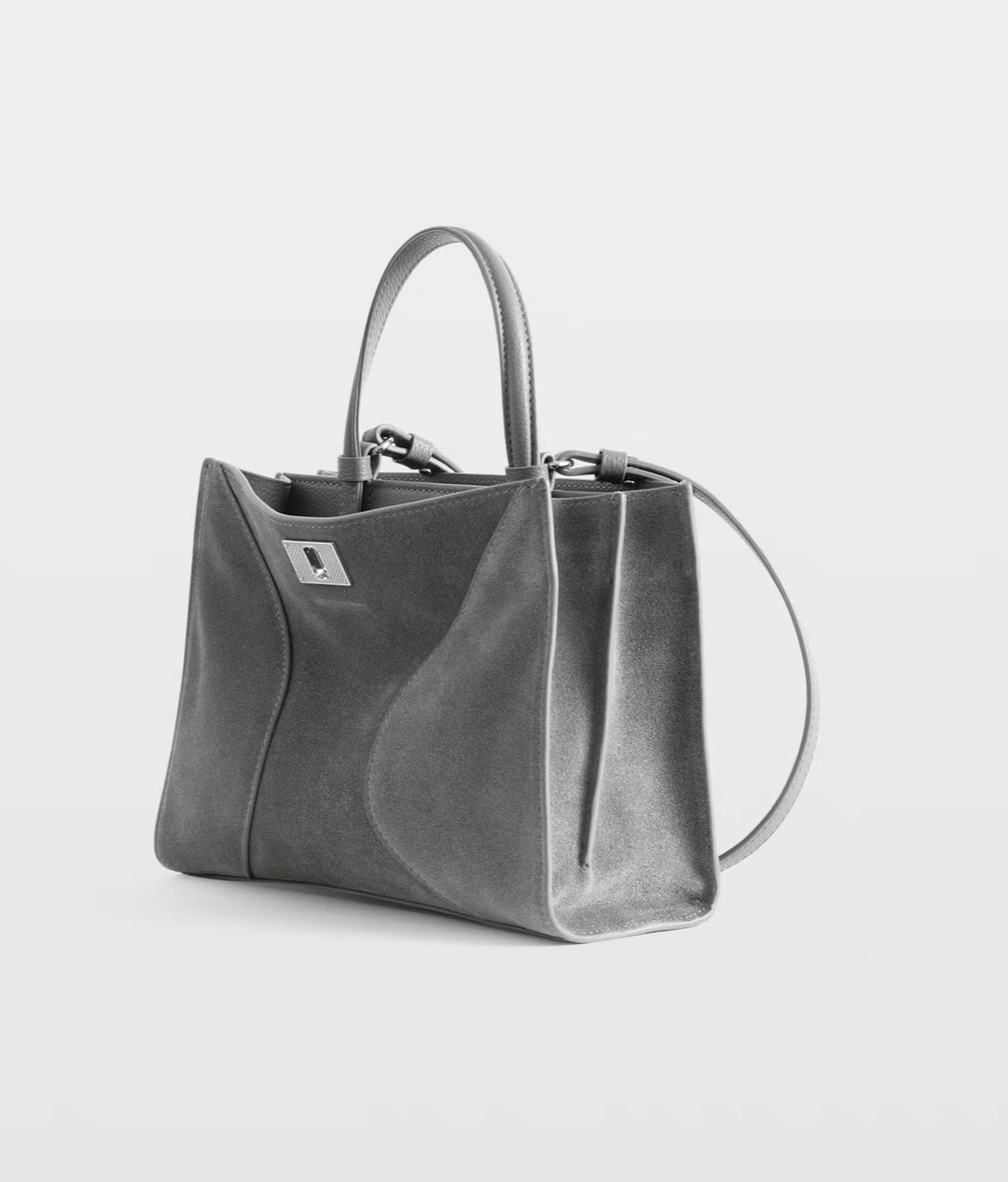 Jack Mini Bag

Small suede bag featuring a signature wings clasp, two compartments, an adjustable handle and removable strap.

#LTKTravel #LTKWorkwear #LTKootd