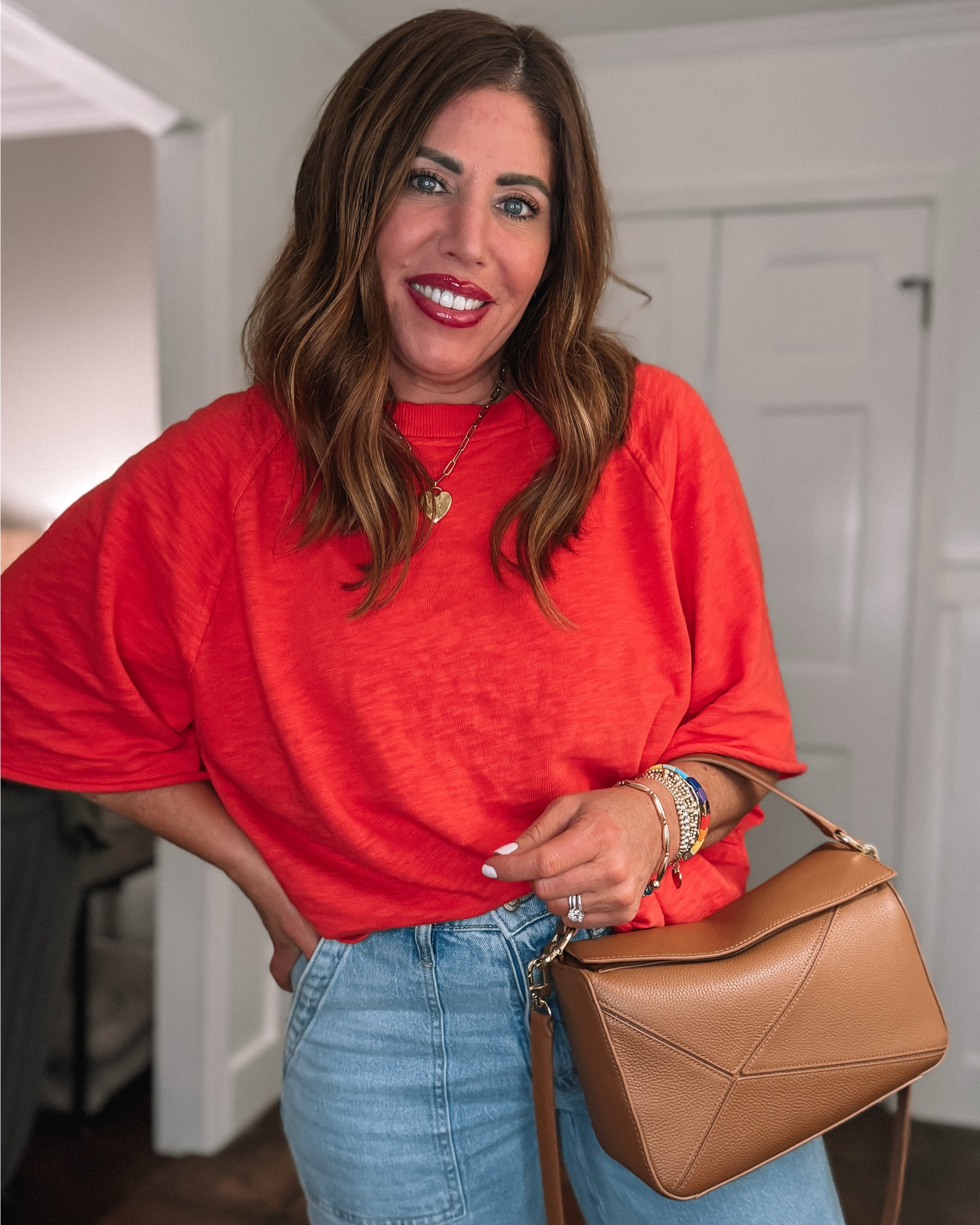 Casual spring outfit

My favorite oversized, cotton slub tee from aerie in this pretty bright red/orange. I’m wearing a medium. It’s on sale 30% off.

These jeans are a look for less from Walmart. They’re under $30. The fit is so good. They’re very comfy and very flattering. They are a 30 inch inseam and slightly too short for my legs so I cuffed them. They have the perfect amount of stretch and they come in several colors 

Look for less sandals are from Amazon. They’re super comfy and versatile and true to size 

This look for less Crossbody bag is gorgeous. It comes in several colors and it’s under $180 versus over $2000 ￼￼

#LTKSaleAlert #LTKootd #LTKOver40