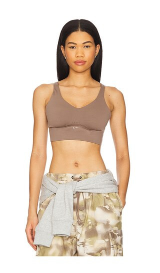 Nike Longline Padded Sports Bra in Brown. - size S | Revolve Clothing (Global)