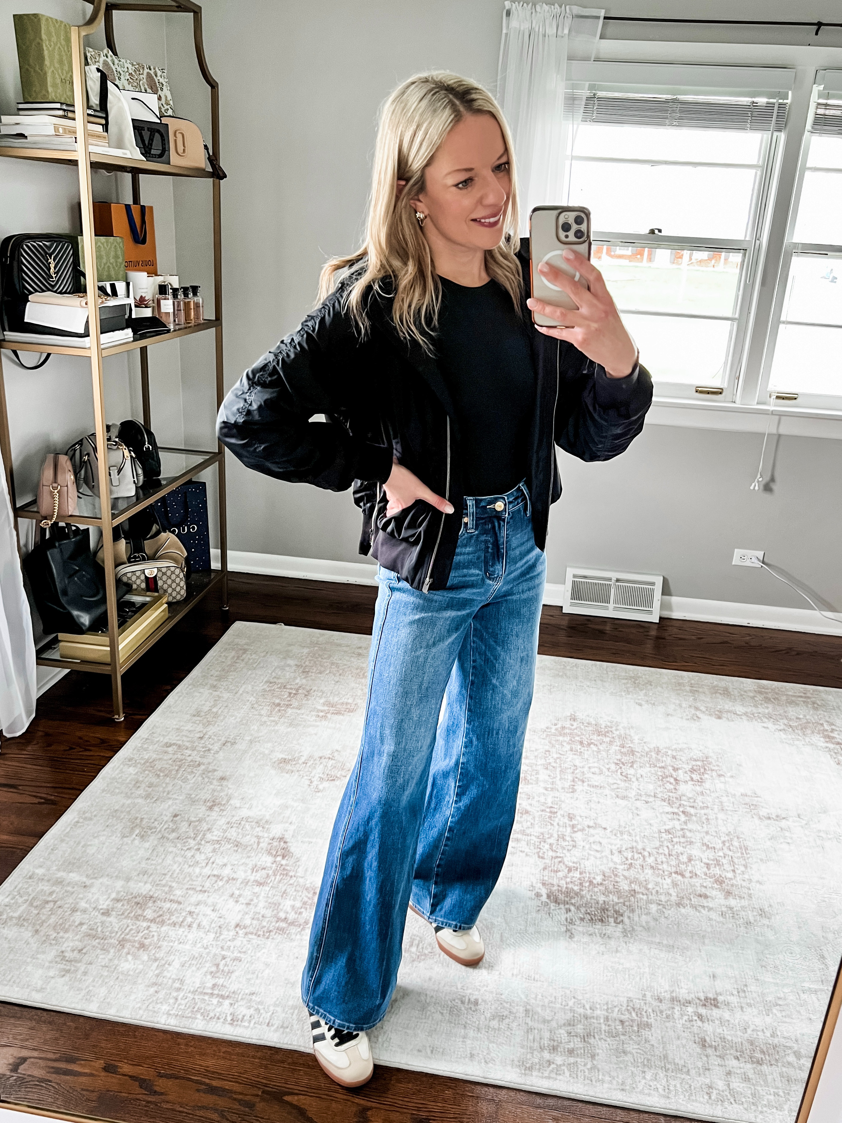 OBESESSED with this Jetset Bomber Jacket from Athleta. I am wearing a medium in the black here.  

 #LTKootd #LTKSeasonal #LTKTravel