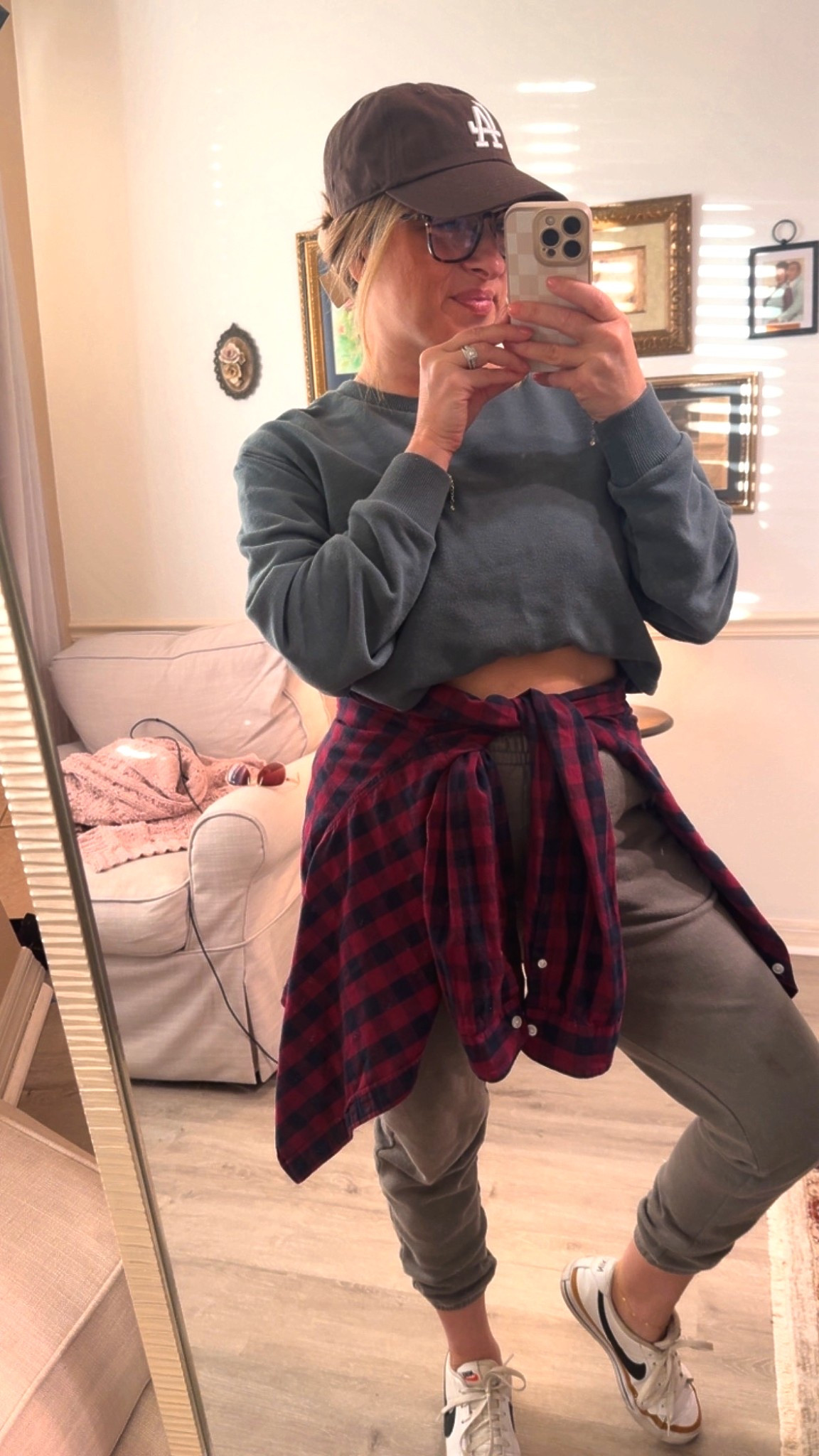 The “I have stuff to do but I’m keeping it cozy” outfit.
Sweatshirt, joggers, sneakers, done.
Tied a flannel around the waist because… 90s kid forever.


#LTKStyleTip #LTKgrwm #LTKootd