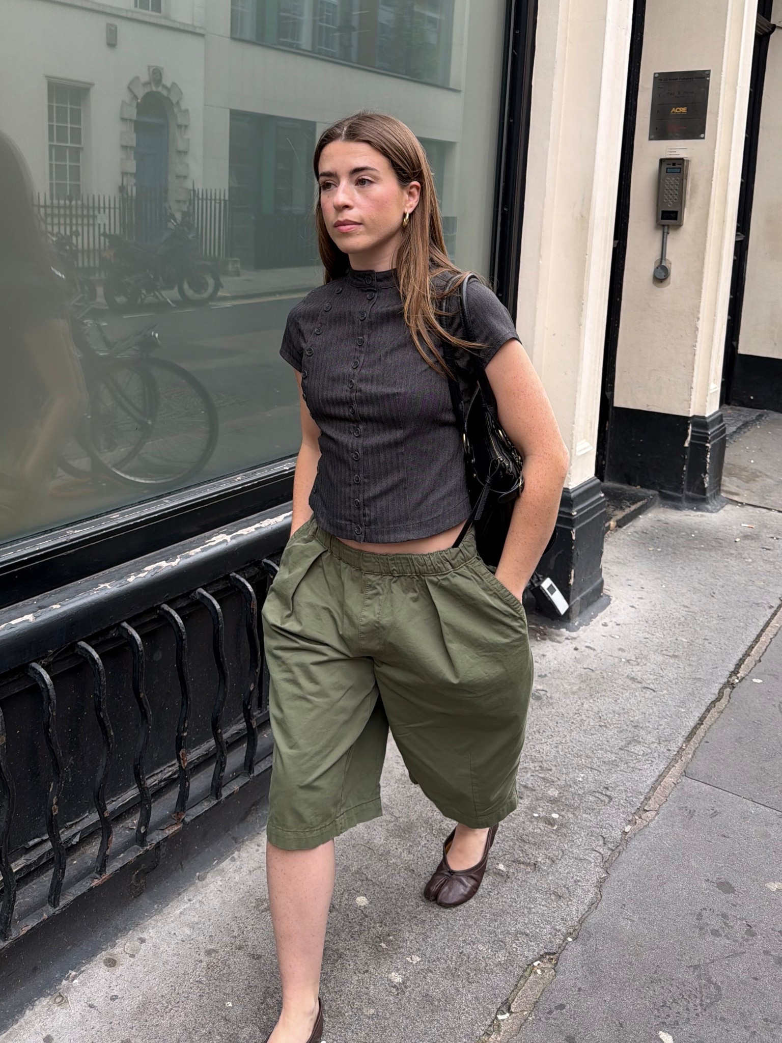 Green shorts teamed with a grey button top @urbanoutfitters-eu ad 



#LTKspring #LTKuk #LTKeurope