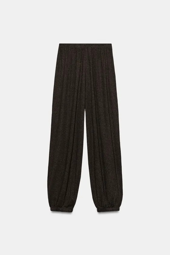 Model height: 173 cmMid-waist trousers with an elastic waistband and elastic cuffed hems. | Zara UK