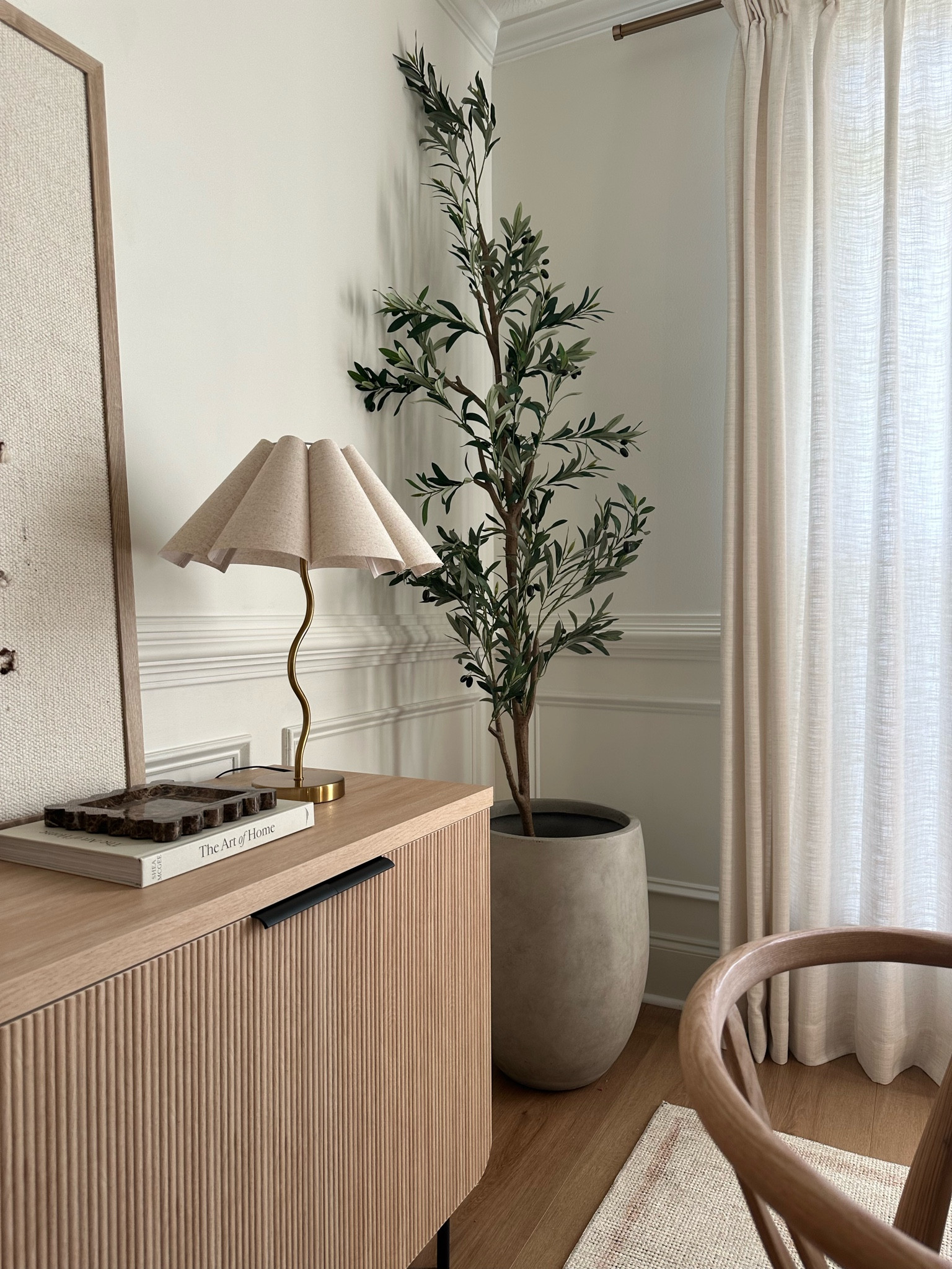 7’5” beautiful olive tree! Concrete planter- console table- tv stand sideboard lamp! 

#LTKSeasonal #LTKHome #LTKFindsUnder100