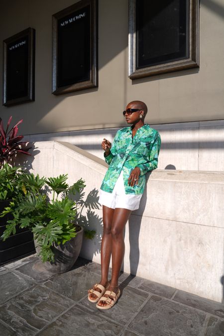 Vacation outfit! Palm print long sleeve shirt, white pull on shorts, raffia double strap sandals and tortoise sunglasses  

#LTKFindsUnder100 #LTKStyleTip #LTKTravel