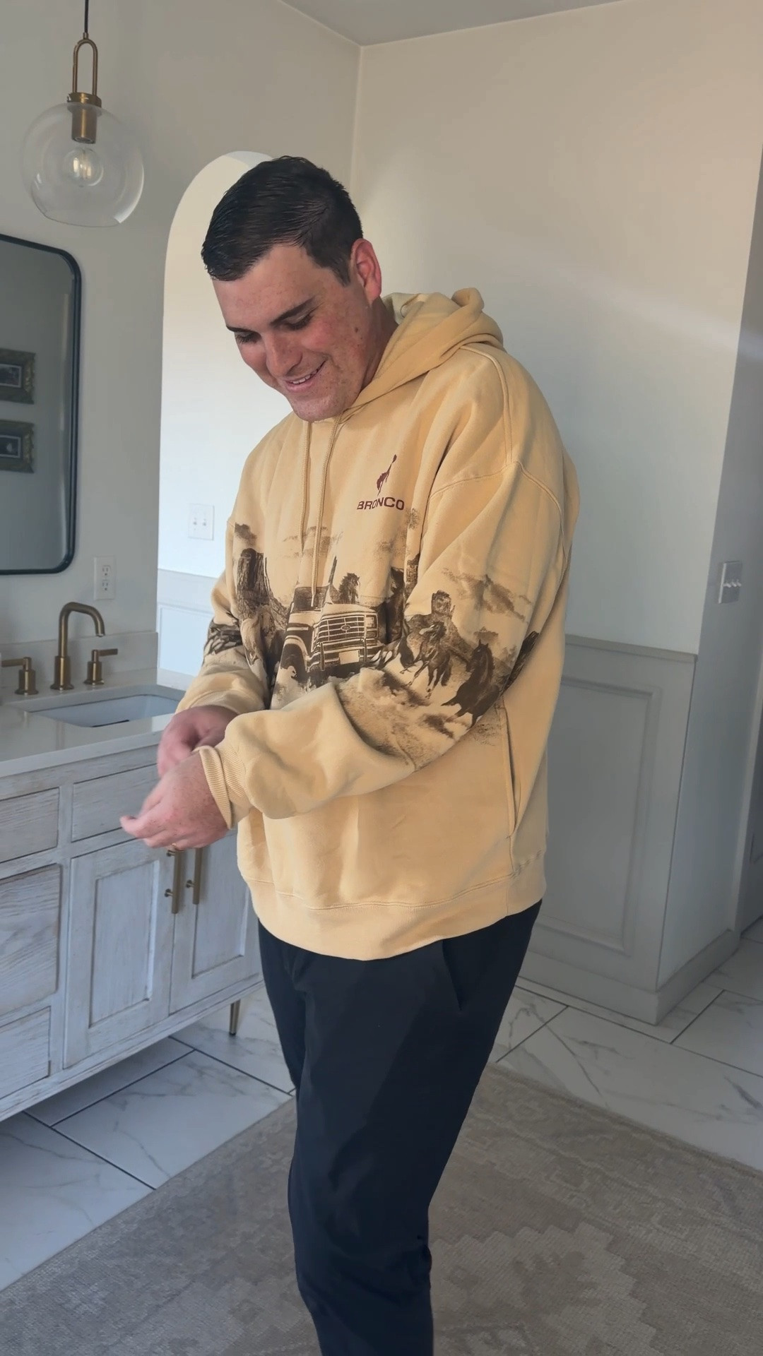 Cale wears a 2Xl in the Bronco hoodie under $20