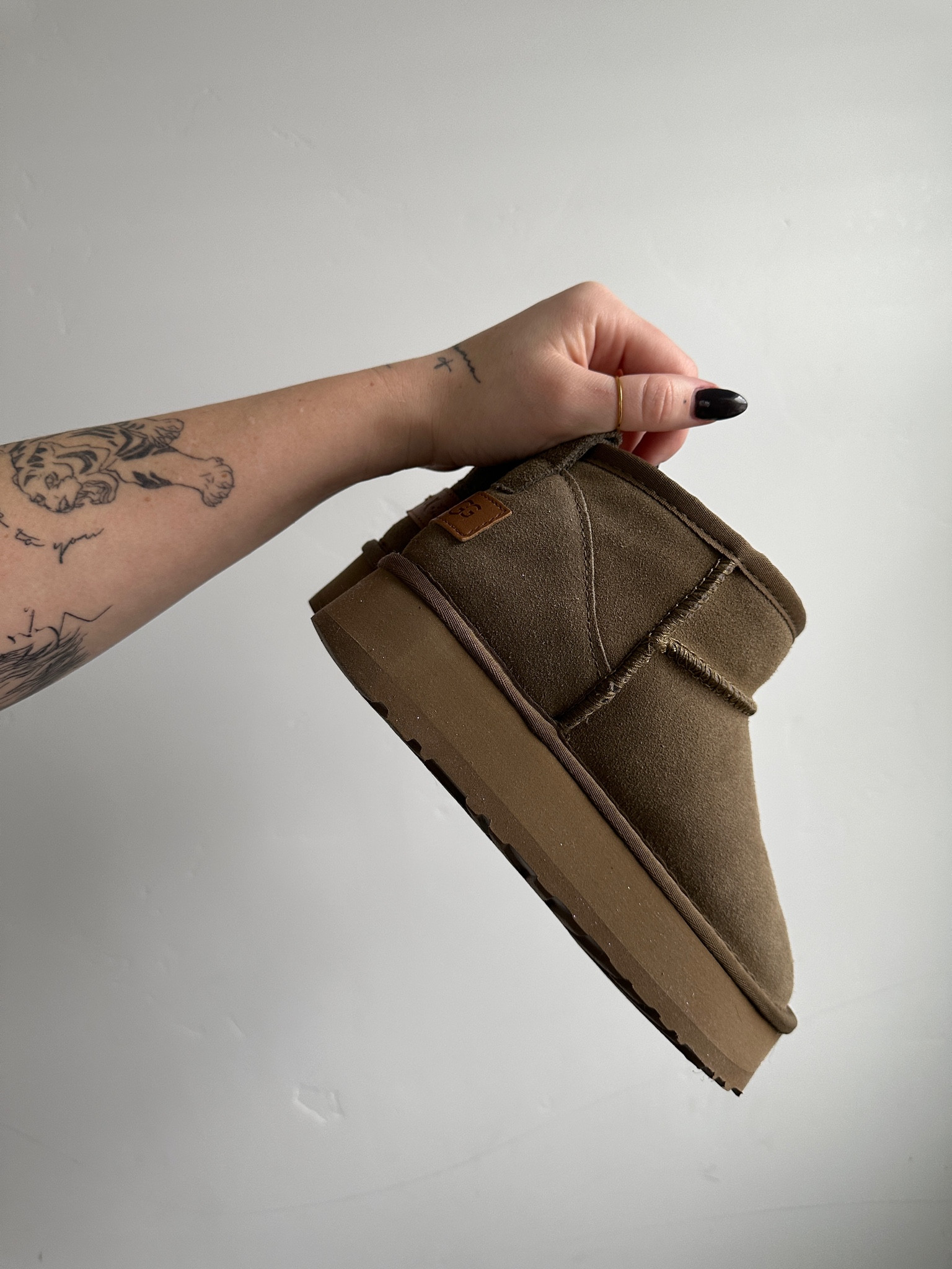 D H [gate] Mini Ugg. I'm a size 7.5-8 and got a 38! They're perfect! 