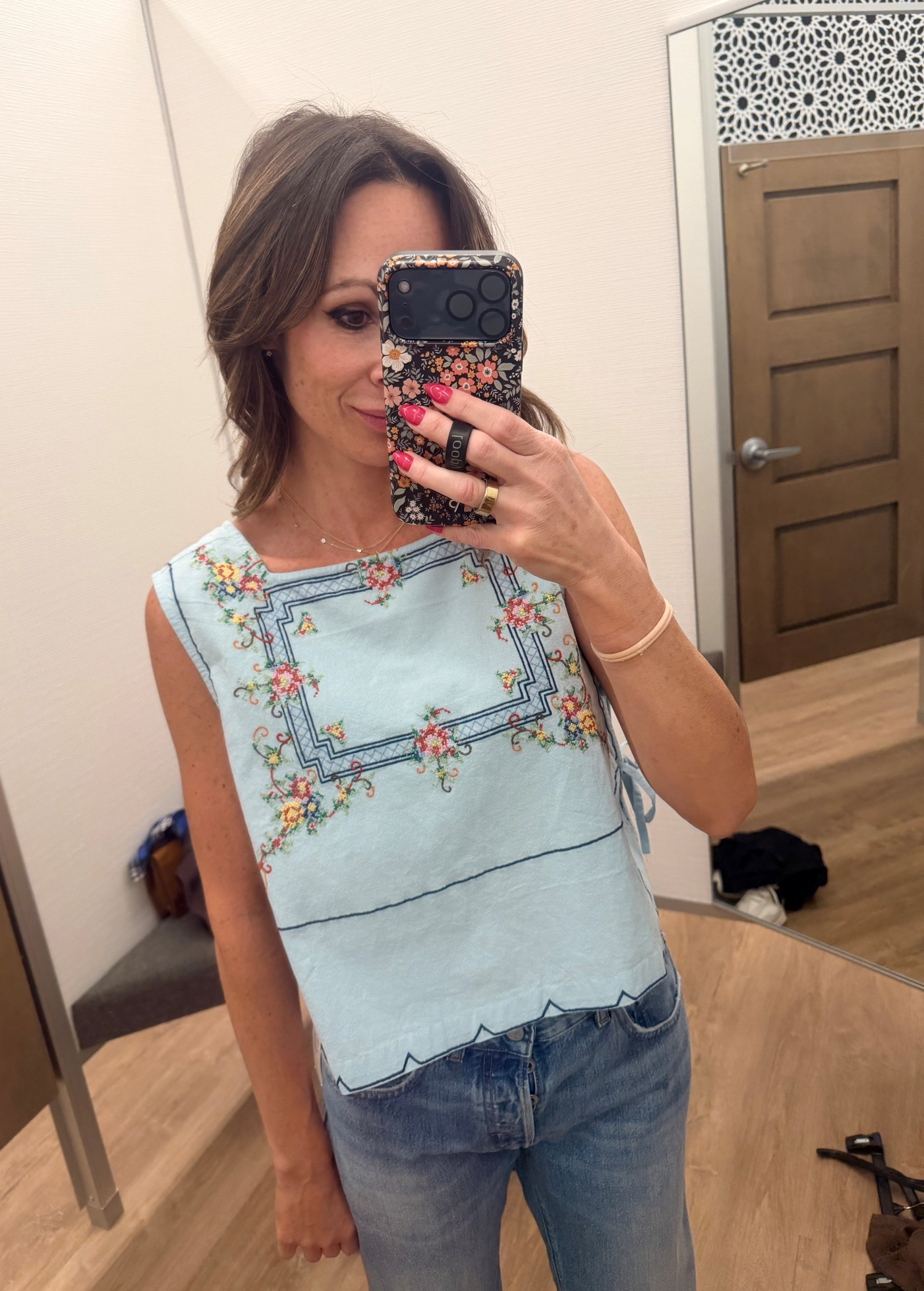 This Free People shirt is the absolute cutest. It has gorgeous detail. It is embroidered, a slight crop top, and has tie sides and a square back .

#LTKmomlife #LTKSeasonal #LTKOver40