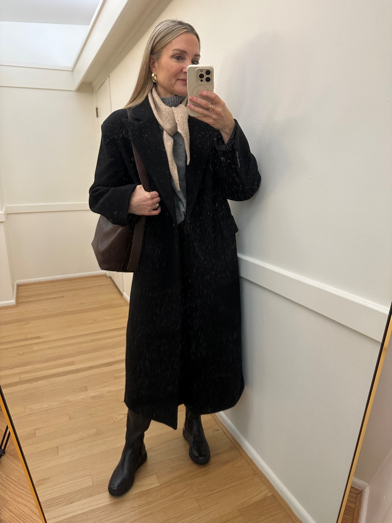 Church outfit. Black long wool coat with black knit skirt, naturalizer boots and triangle scarff

#LTKootd #LTKFindsUnder50 #LTKOver40