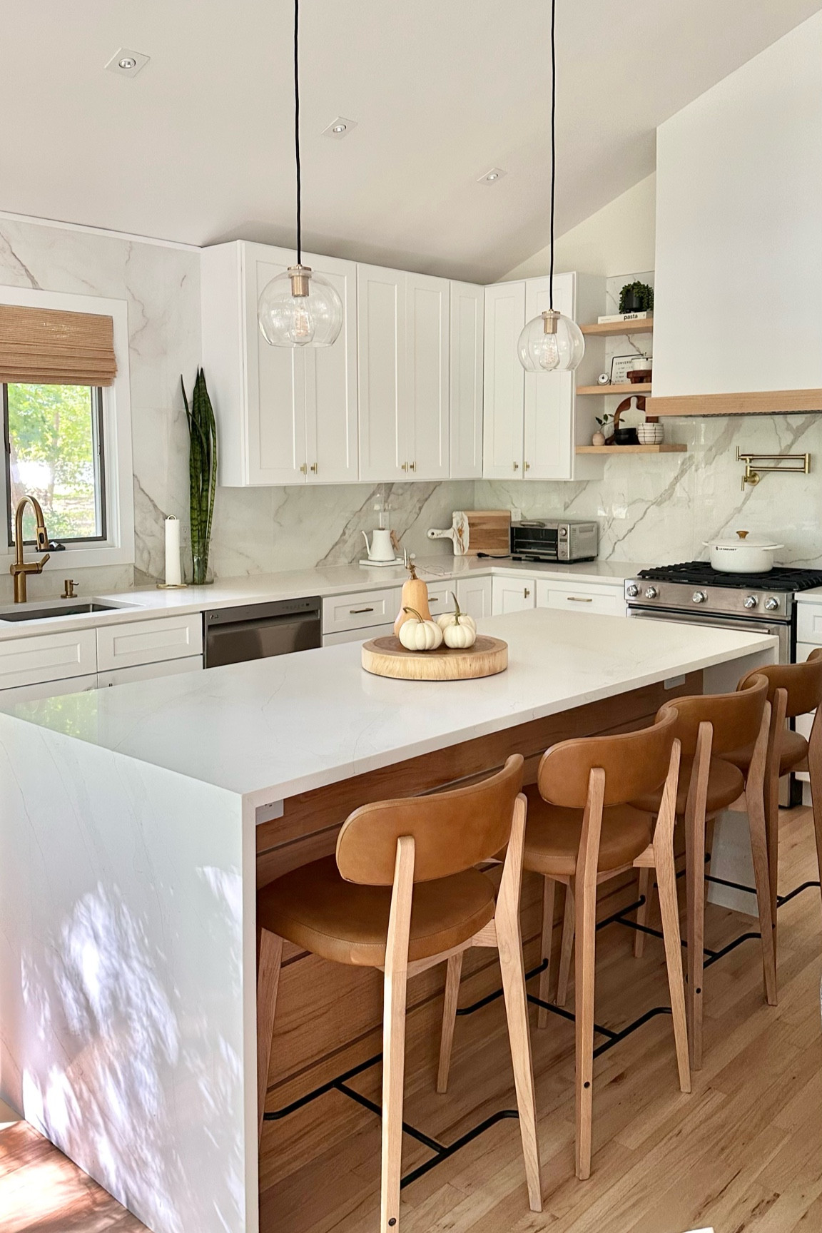 Fall mornings at the chalet with some new mini pumpkins 

Kitchen
Mid-century modern
Counter stools
Home decor
Bamboo blinds
Gold hardware
Tea pot
Oven
Fall decor
Pendant lighting

#LTKhome #LTKSeasonal #LTKfindsunder100