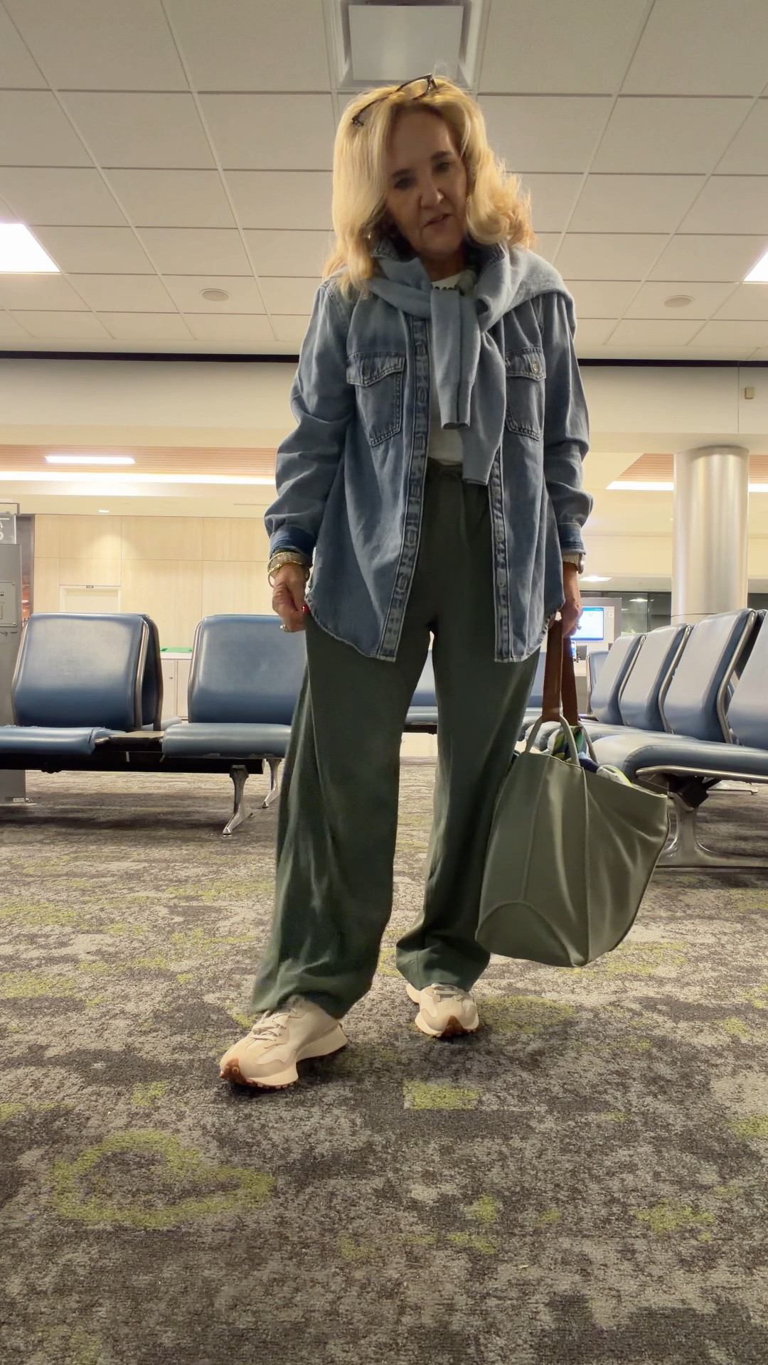 Travel outfit heading to NYFW and to spends some time with family. 

These are really great pants! Wearing a med reg 
Denim shirt jacket is a medium
This new white tea has passed become my favorite. I’m wearing a new. It’s fitted, but it’s not tight.
My go to travel sneakers right now are these new balance 327 I’ll link a couple of sources so you can find your size
First time using this bag as a travel coat and I think it’s gonna work great. My suitcase was at 49 pounds so bringing an extra tote for traveling home. I’ll link that as well.

#LTKNYFW #LTKOver40 #LTKTravel