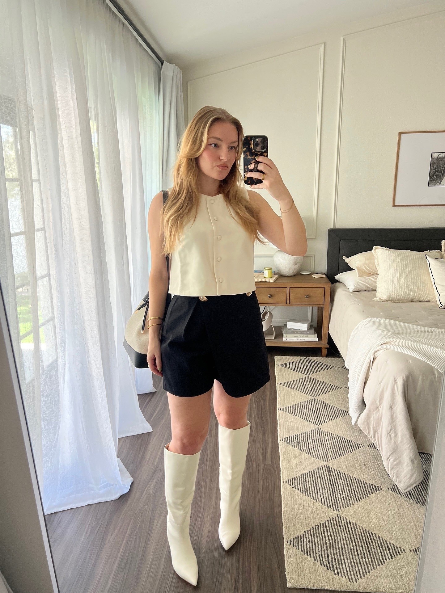 Sezane altea top, Karen millen skort, white knee high boots

#LTKShoeCrush