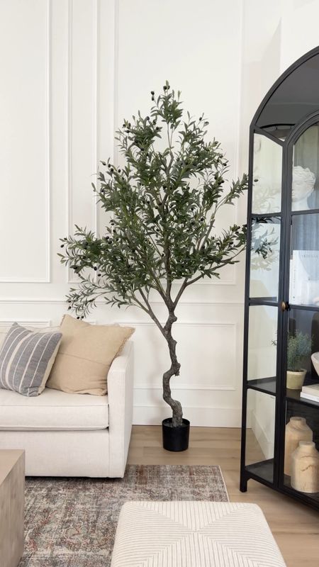 How to elevate your faux plants! LOVE this faux olive tree, it looks very realistic and it makes a statement in any room. Also linked the planter, moss and our living room decor



#LTKhome