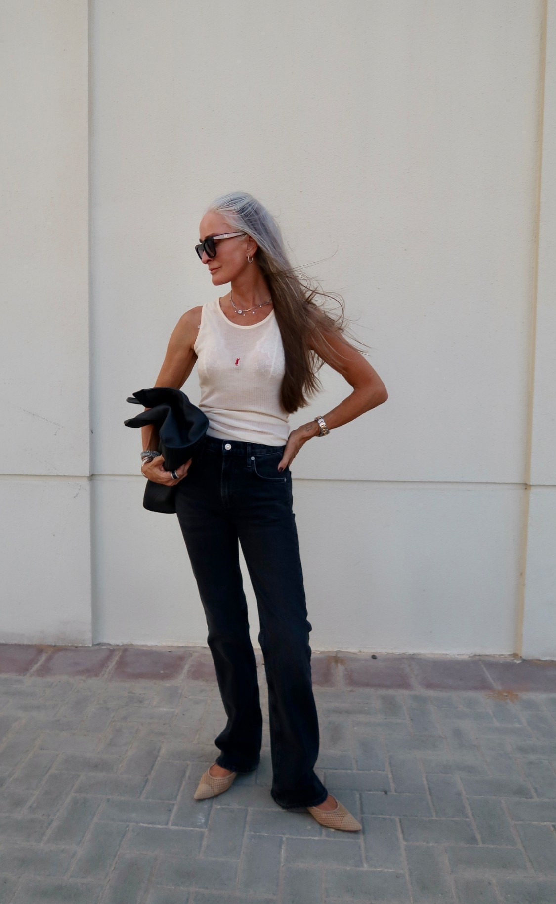 Jeans and a tank
Saint Laurent, Gucci, Jennifer Chamandi, black jeans, flat shoes, Carolina Herrera   

#LTKover50style #LTKstyletip #LTKluxury