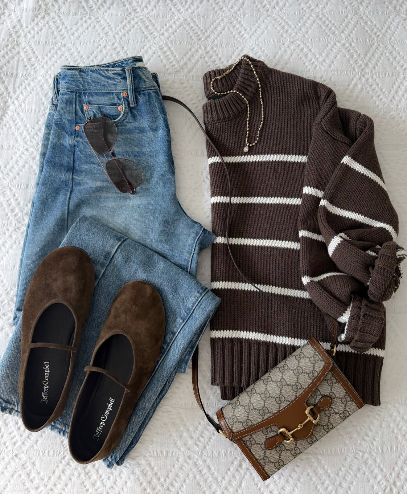 This is the kind of early fall outfit I love when it’s still too warm for heavy layers. The chocolate striped sweater with classic denim feels seasonal without trying too hard, and the suede Mary Janes tie the whole look together.

early fall outfit, fall outfit idea, striped sweater, chocolate brown sweater, denim outfit, straight leg jeans, suede Mary Janes, fall flats, casual fall style, transitional outfit, annabrstyle

#LTKSeasonal #LTKootd