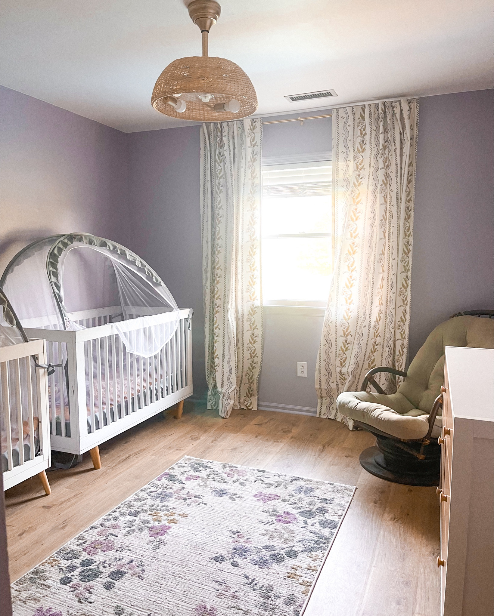 Links for the girls room. Not decorated yet but it’s coming together and I’m loving the pieces. The curtains are from Spoonflower and though I’ve been ordering fabric from them for years this is my first time ordering curtains from them. I’m so impressed with the quality and so happy with them. The light fixture isn’t only super cute but it’s also a fan and works so good. The rug was the first thing I ordered for their room and I instantly fell in love with it. It has all the colors I wanted to use in their room and it just felt perfect. 
The crib tents have been a life saver. One of my girls was climbing out and the other one would throw all of the things out of her crib and cry while I searched in the dark for her pacis. 
Can’t wait to decorate more but loving it so far! 

#LTKBaby #LTKHome #LTKKids