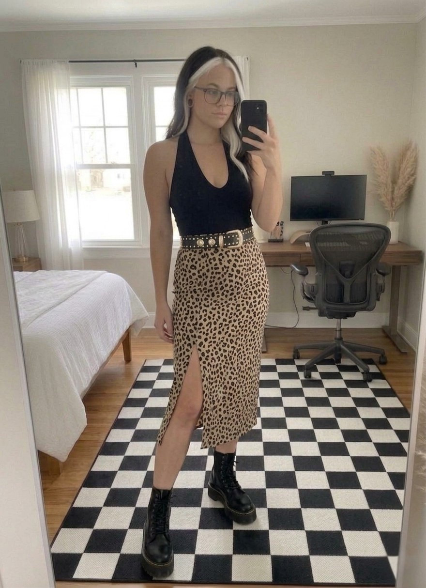 Transitioning your wardrobe has never looked this good. This look is all about balancing feminine prints with tough, edgy accessories. I’ve paired this high-slit leopard midi skirt with a sleek, deep-V halter top to create a flattering silhouette that feels both elevated and effortless.
The real stars? These chunky Dr. Martens Audrick boots and a gold-studded belt that adds just the right amount of "cool girl" energy. Whether you’re headed to a concert or a weekend brunch, this fit is a total head-turner.

#LTKootd #LTKSeasonal #LTKMidsize