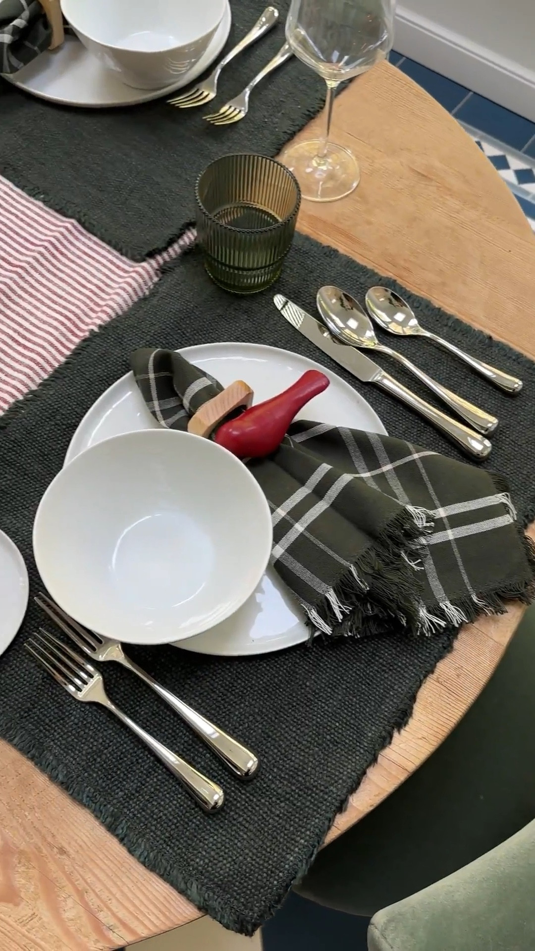 Here’s how I took my Thanksgiving tablescape to Christmas (using work-anywhere products from Crate & Barrel): I switched out the runner, added red candlesticks, a pop of red with the ornament, and those green trees. In person this felt appropriately “Christmas brunch” and you bet we put on Mariah Carey.

I LOVE those trees (they match my dining chairs and my sofas perfectly so they are my new Christmas element this year).

The red candlesticks even make the amber candleholders look more festive. It tricks your eye. The red and white ticking stripe runner could be great on a buffet (or in our case our island where we put out all the food for our casual 30-person ornament exchange party).

You don’t need special dishware or glasses - just add a few holiday signifiers and call it a (holi)day :) #CratePartner

#LTKParties #LTKHome #LTKHoliday