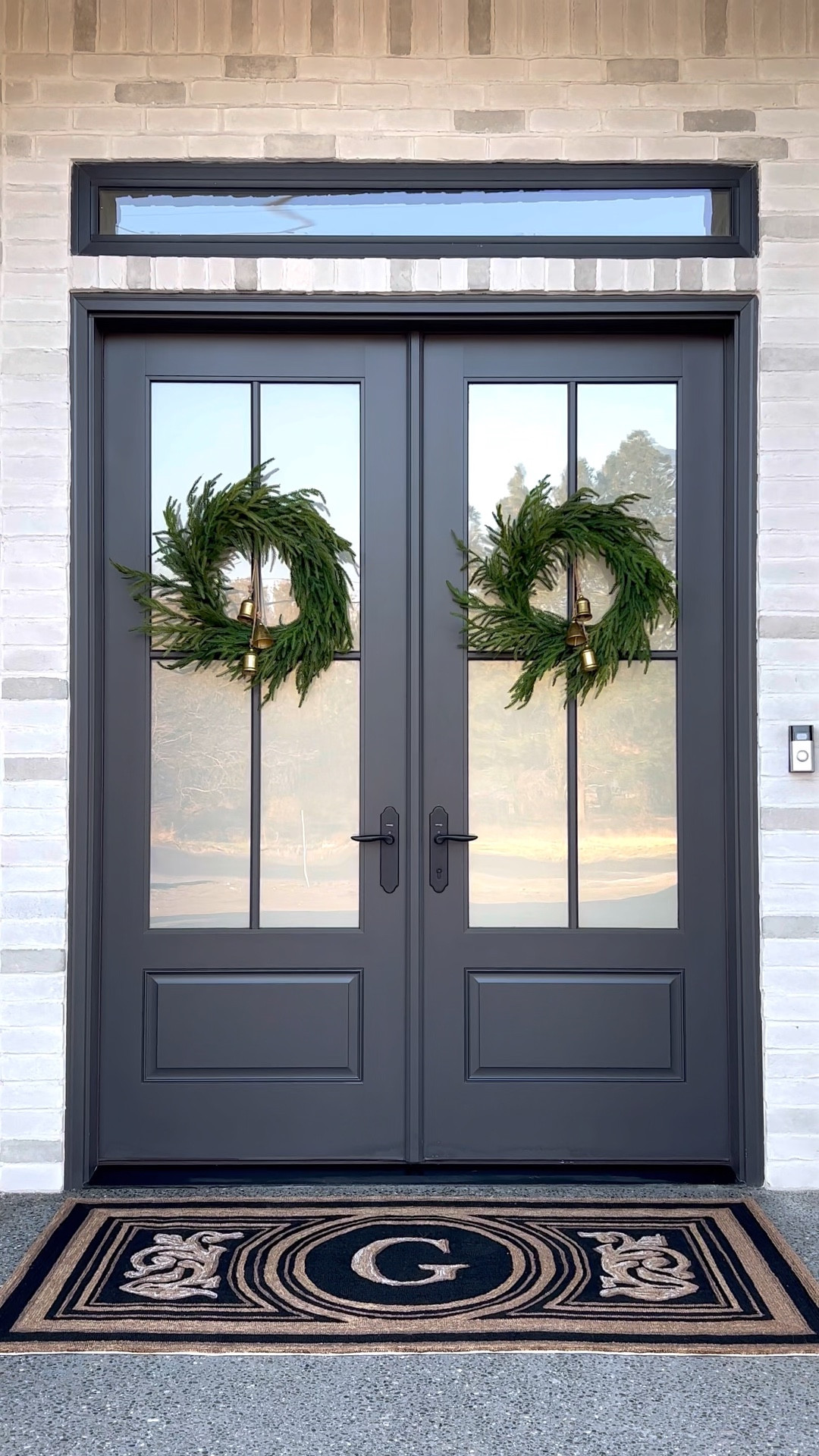 Christmas wreath with bells, personalized front door mat, outdoor lights

#LTKSeasonal #LTKhome #LTKHoliday