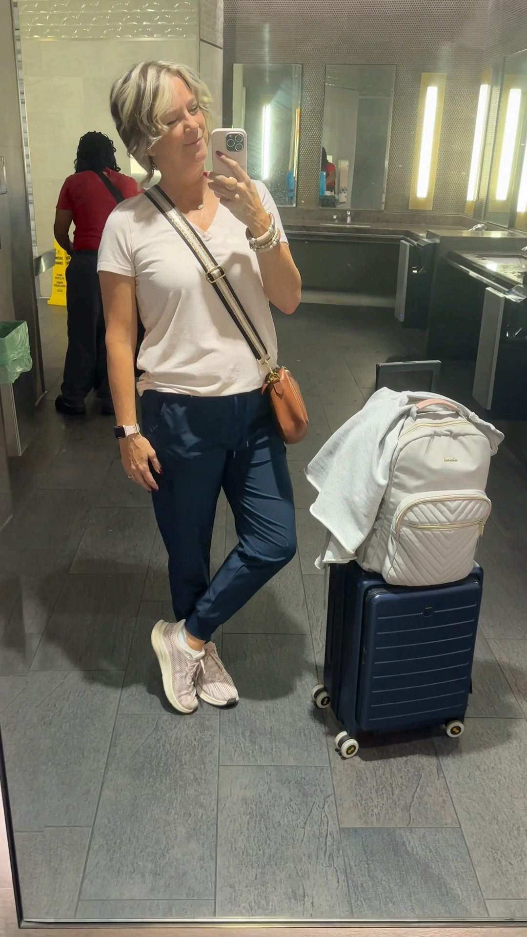 I am 5’8” and size 10, over 50 wearing size L. Shoes are supportive and not frumpy style. Backpack is the 15.6 version. Travel outfit, blush, navy blue, joggers, airport style, over 50, travel style, midlife fashion 

#LTKShoeCrush #LTKTravel #LTKOver40