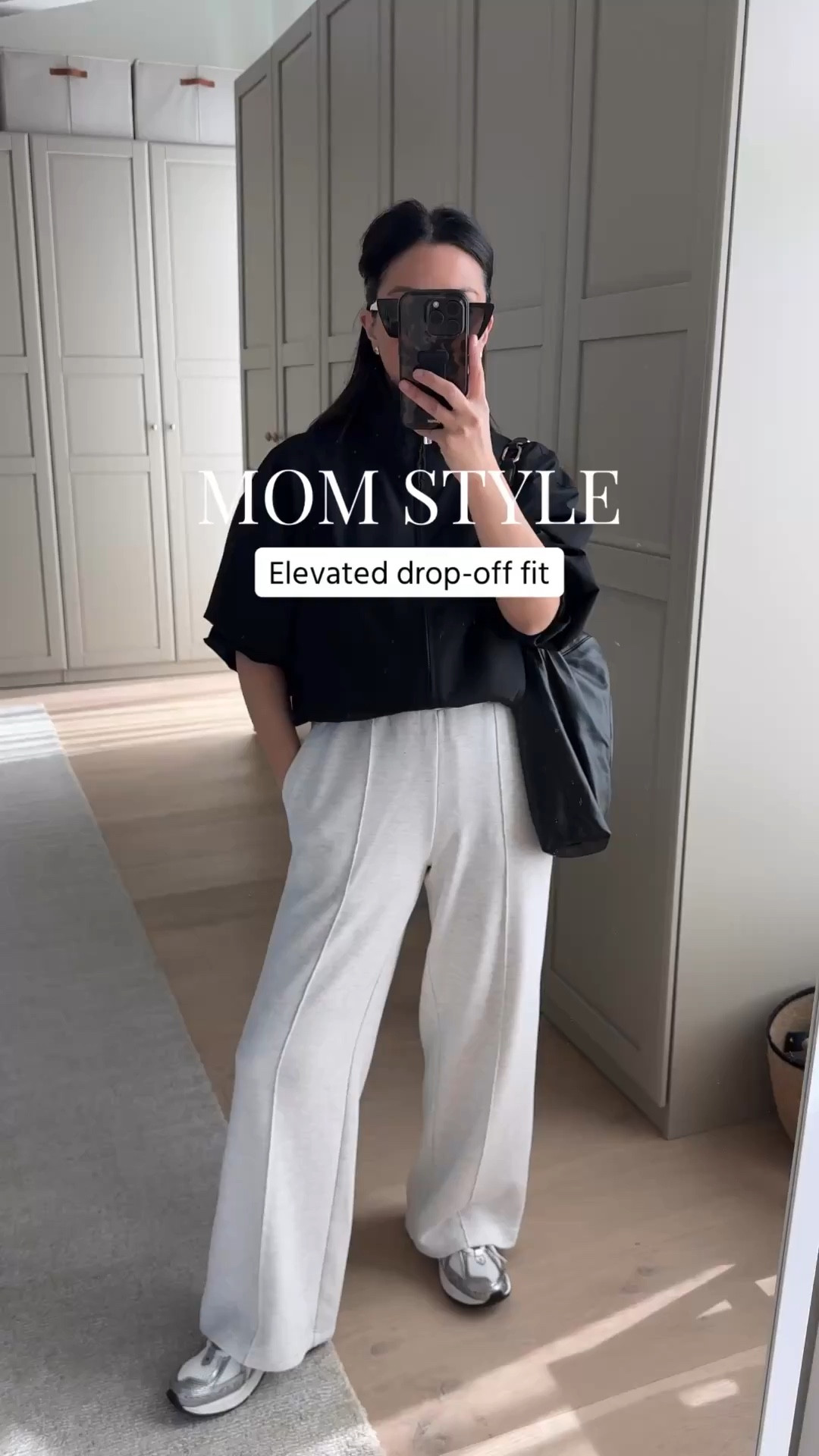 Comfortable, yet elevated mom outfit. Drop-off, athleisure outfit. 

Aritzia jacket small but need the xs
J.crew tee small
Varley wide leg xs 28 inseam
New Balance 1906R 6 
Anine Bing Kate bag
YSL sunglasses 

Petite style, mom style, spring style, spring outfits 2026



#LTKootd #LTKmomlife #LTKPetite