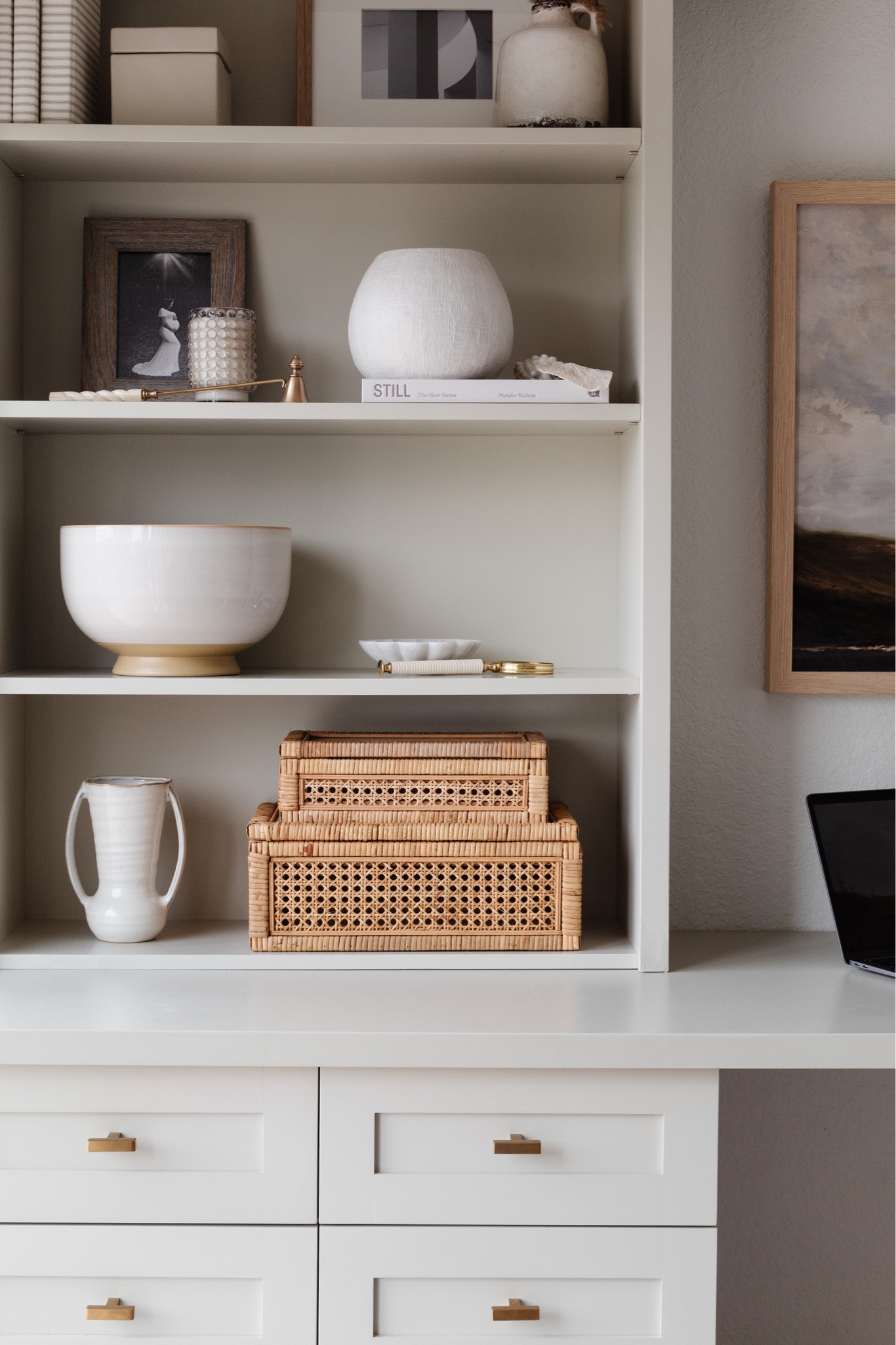 Home office: built ins, shelf decor, rattan cane boxes. 

#LTKFind #LTKunder50 #LTKhome