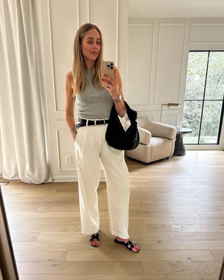 Fashion Jackson wearing grey tank (small), white linen pants ON SALE!!! (size down) black Hermes sandals, black bottega handbag, black silver belt, summer outfit #fashionjackson #nashvilleoutfits #summeroutfits #sandals 



#LTKstyletip #LTKsalealert #LTKover40