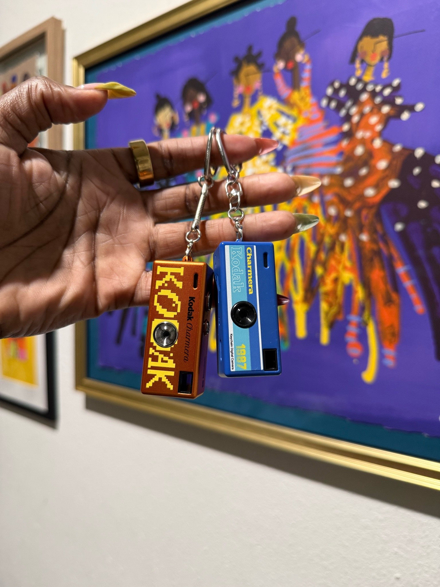 Mini camera charm that takes photos and videos!