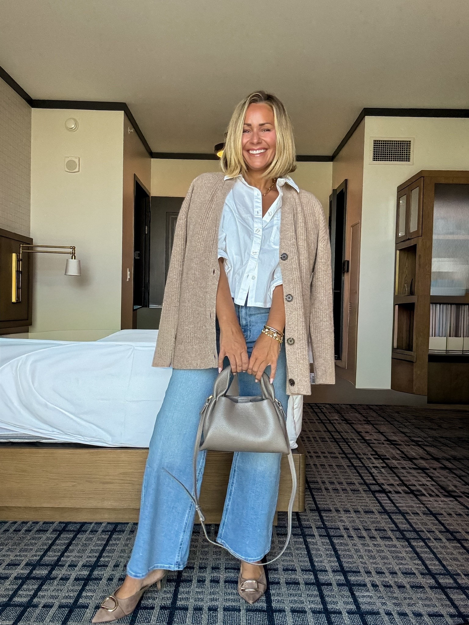 Hellooooo fall fashion 🤎 Quince is my go-to for all things capsule wardrobe pieces. These pieces I will wear for years and with so many different outfits! And the quality is a huge YES from me!!! 👏🏼👏🏼 

Denim jeans - fall staples - fall wardrobe - white button down shirt - kitten heels - grey purse outfit - chunky cardigan - chunky sweater - layering - fall style 

#LTKStyleTip #LTKSeasonal