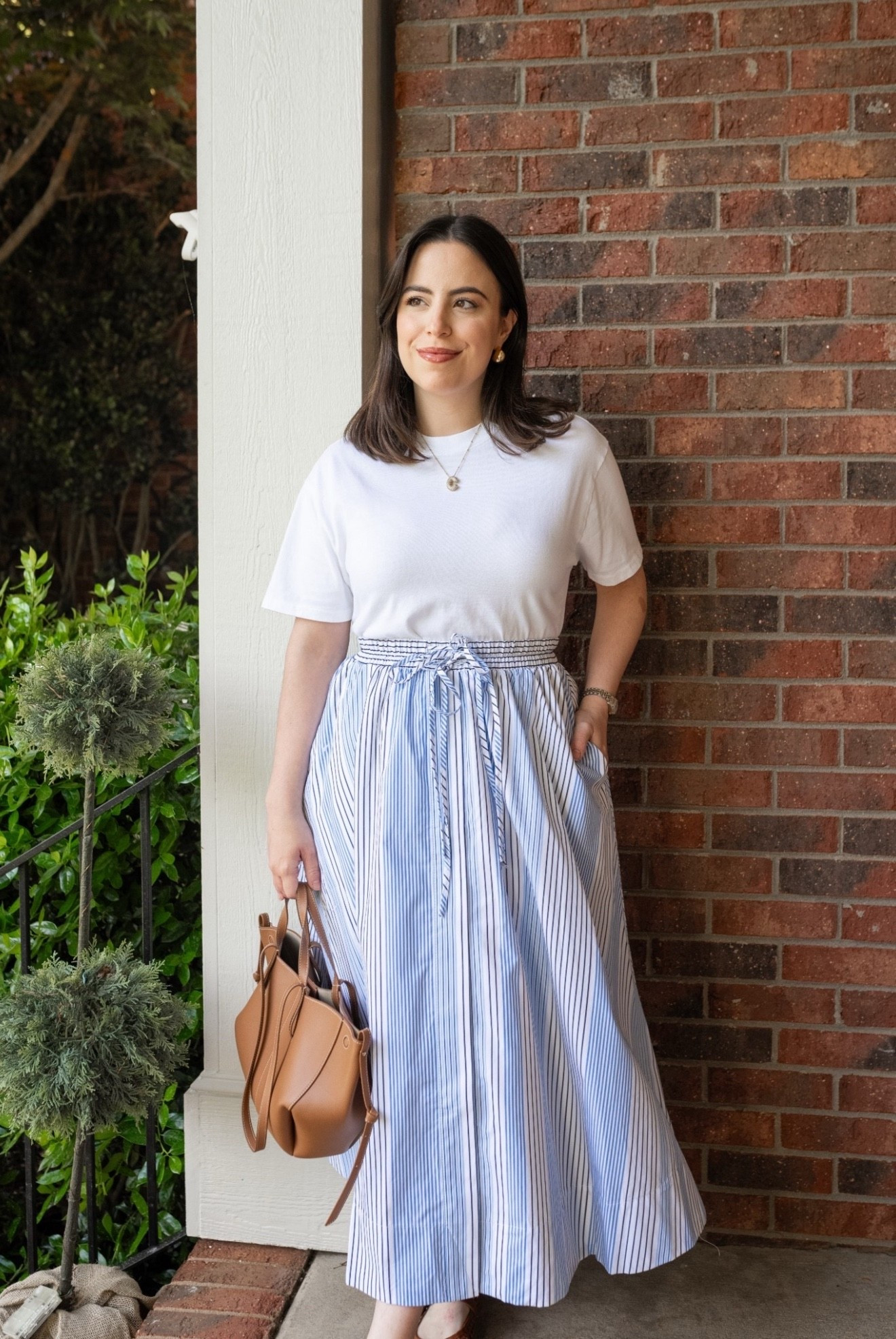 Here's how I styled a classic spring look you'll love for the season! This striped midi skirt is seriously perfect and I’m in the size XS. It is such a timeless vibe for spring. Also linked some alternatives for your easy access.

spring outfit 2026, casual chic, modest look, outfit inspo, petite fashion, mom fits, old money vibes, preppy style

#LTKootd #LTKSeasonal #LTKPetite