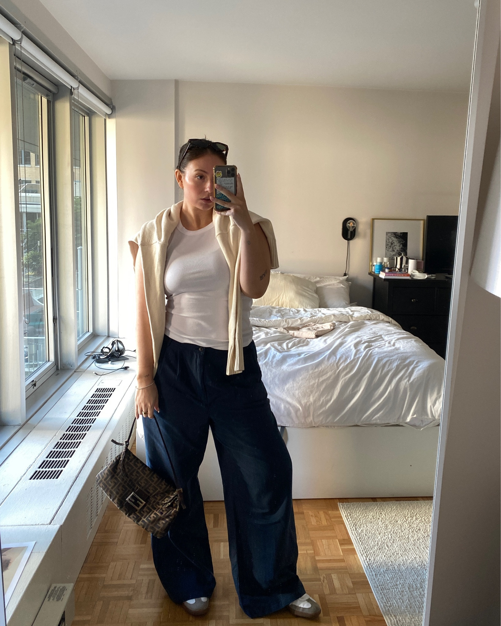 turn any summer outfit into a transitional fall outfit with the sweater over the shoulders style hack 

sized up in the trousers for a lower baggy fit 

#LTKmidsize #LTKworkwear #LTKunder100