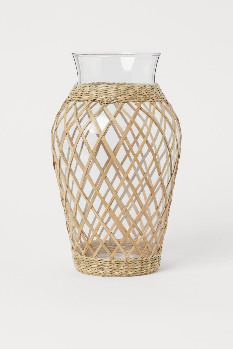 Vase in glass surrounded by braided seagrass for a cozy feeling indoors or outdoors. Diameter at ... | H&M (US + CA)