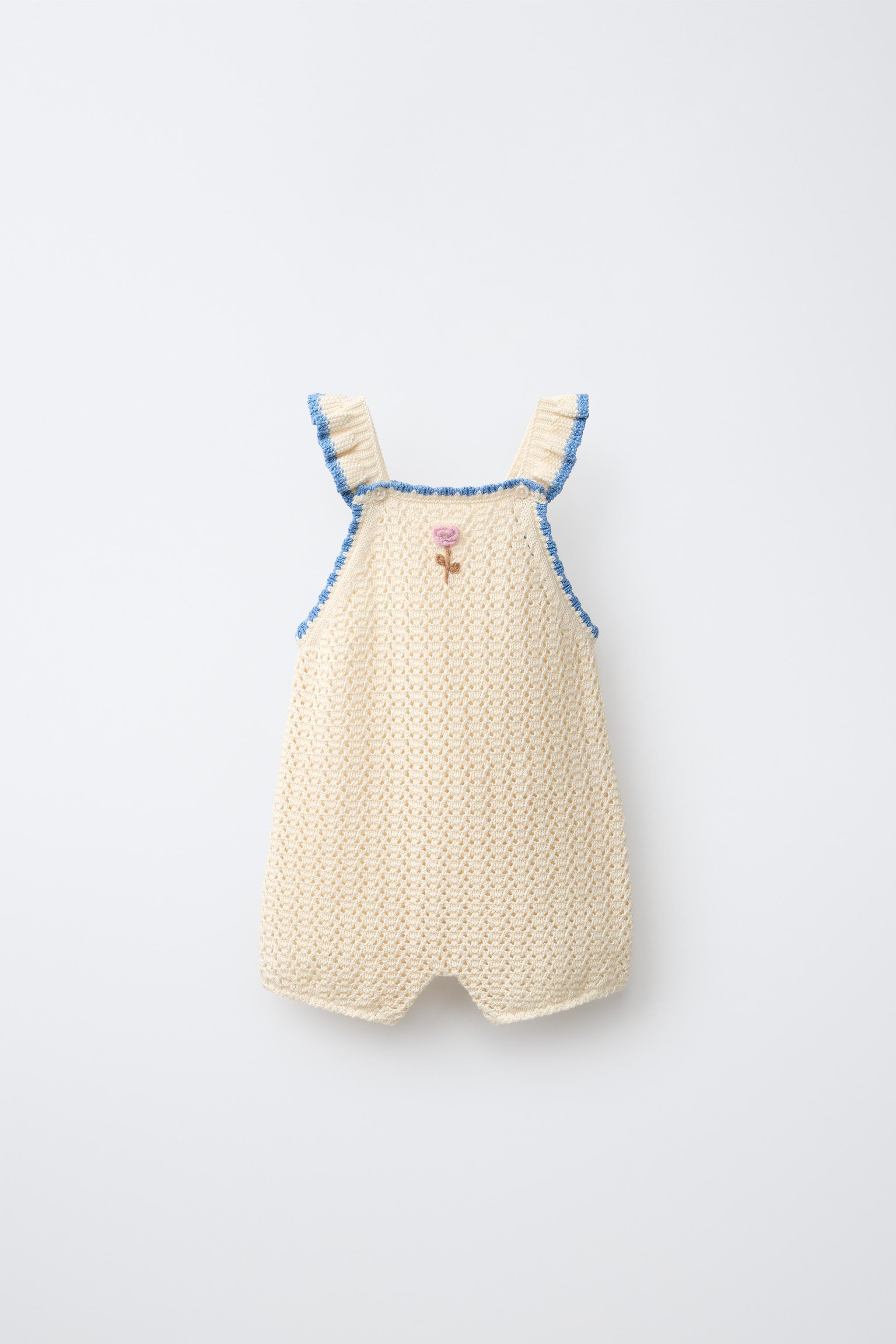 Knit romper with straight neckline and ruffled straps. Button closure at straps. Embroidered flor... | Zara US
