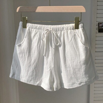 Women Solid Color Waist Tie Pocket Relaxed Casual Shorts | SHEIN