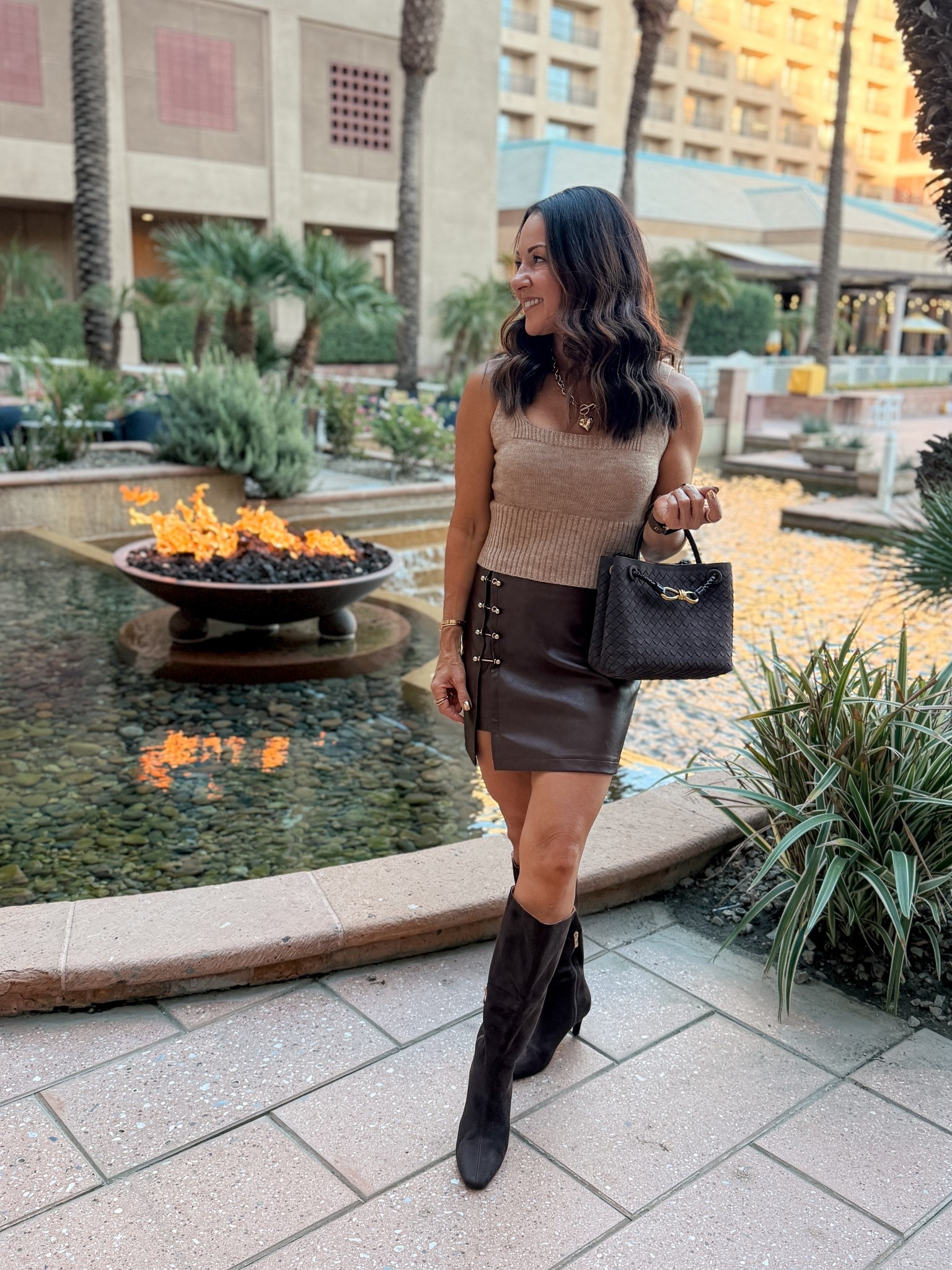 Fall Outfit perfect for date night or girls night out! 
Sweater tank XS, faux leather skirt XS, boots go up if in between sizes. Love this bag you can wear it multiple ways including crossbody. 
For reference: I’m 5’1”, 109lbs



#LTKPetite #LTKOver40 #LTKFindsUnder50