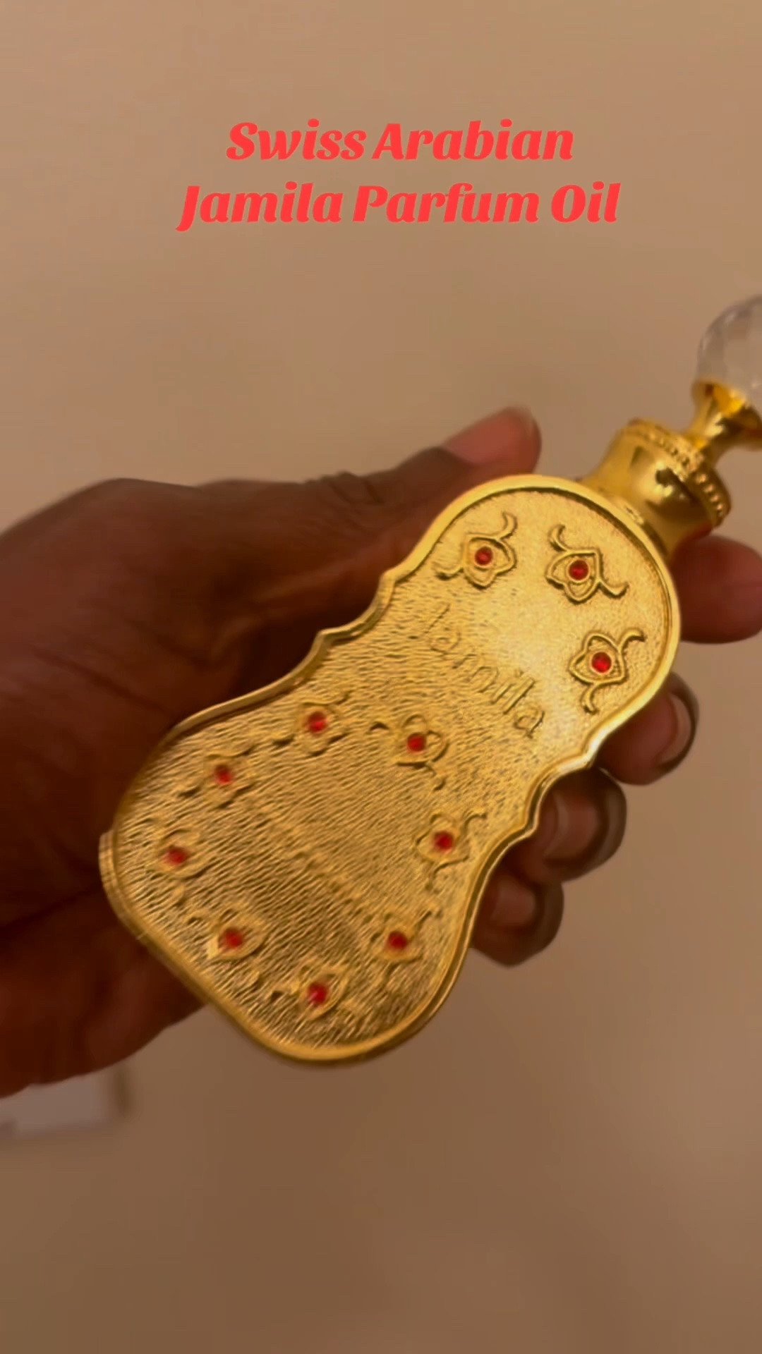 Spring and summer scents don’t get much prettier than Jamila by Swiss Arabian 🌸✨ This gorgeous perfume oil blends crisp apple, soft white florals, rose, warm amber, and woody notes into a scent that feels feminine, unique, and effortlessly elegant. And can we talk about the bottle?! The deep red design, sparkling gem details, and crystal-inspired cap make it look so luxurious on any vanity. I’m still shocked that Swiss Arabian created something this beautiful at such an affordable price. Definitely a hidden gem fragrance for spring and summer fragrance lovers ❤️💎

#SwissArabian #JamilaPerfume #PerfumeOil #SpringFragrance #AffordableLuxury

#LTKOver40