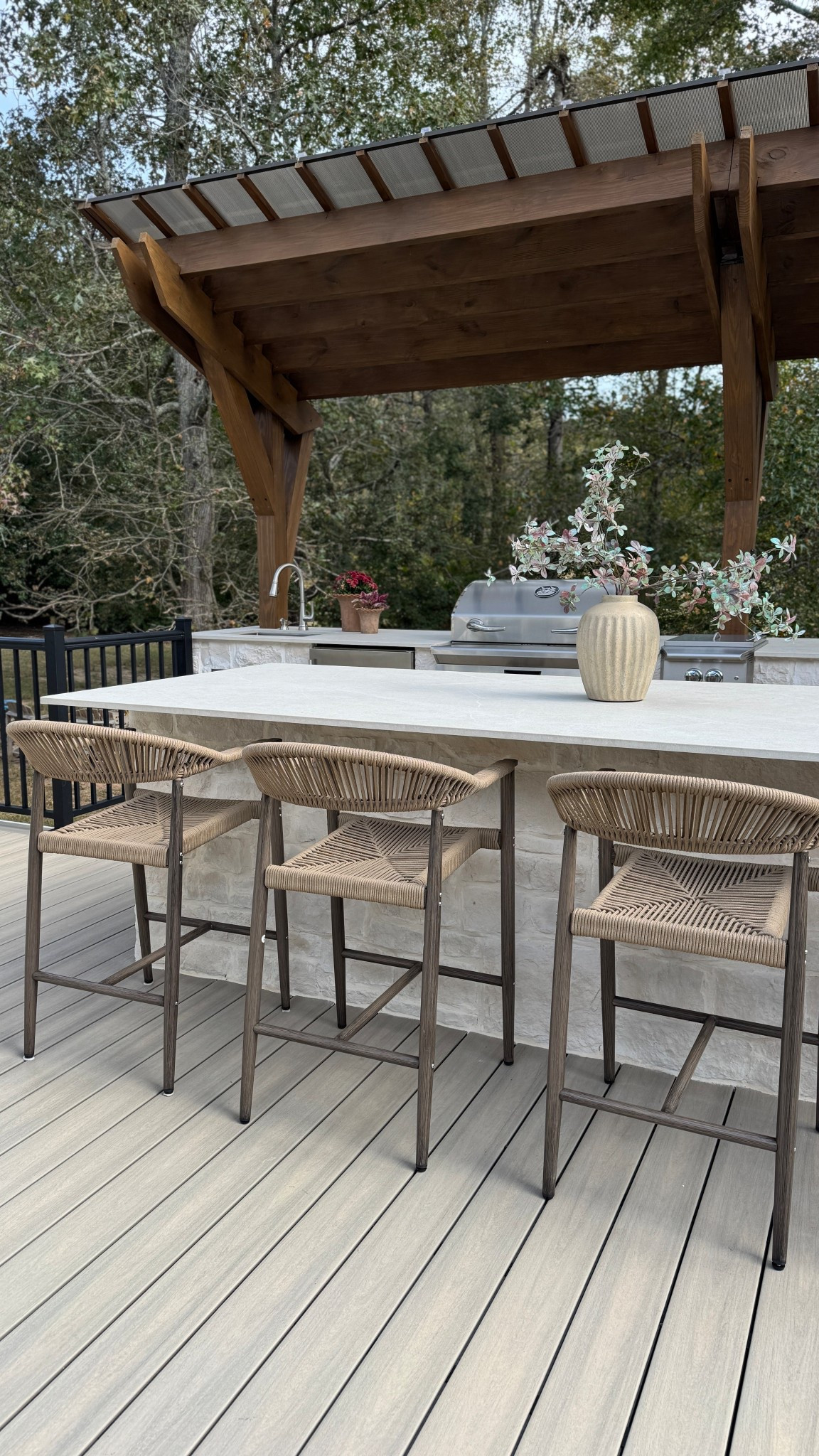The pergola over our outdoor kitchen blends in so seamlessly with the space. We found our barstools on Amazon — they come in a set of four and are perfect for outdoor entertaining. Our Dekton countertop is absolutely gorgeous and completely maintenance-free, making it both stylish and practical. All our appliance are top of the line from the bbq guys  The pots on the counter are from Pottery Barn, and they add the perfect finishing touch to the space.

#OutdoorKitchen #PergolaDesign #AmazonFinds #DektonCountertops #PotteryBarn #OutdoorDecor #BackyardDesign #bbqguys

#LTKHome #LTKStyleTip