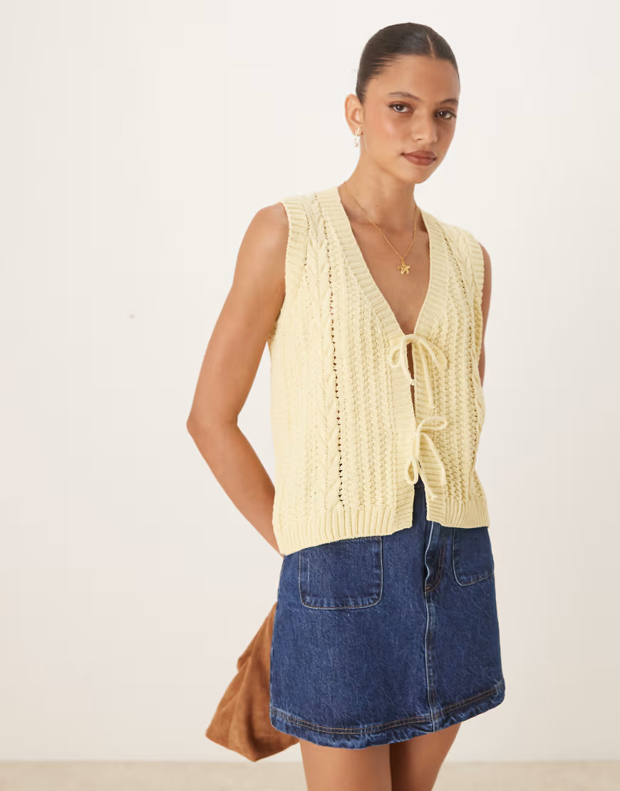 ASOS DESIGN cable knitted tie front vest in buttermilk-Yellow | ASOS (Global)