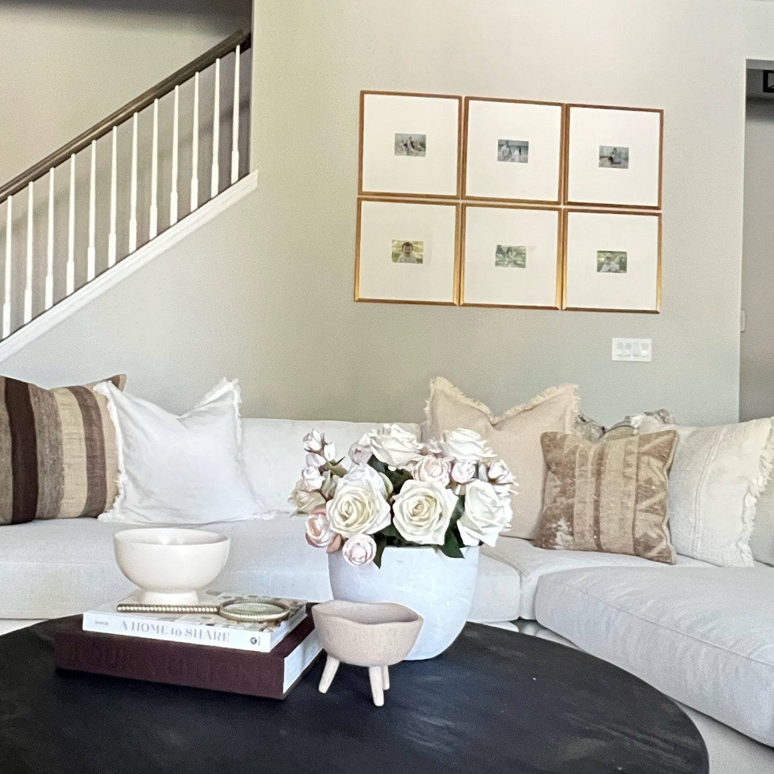 Living room design
White couch
Livingroom neutral design 
Black Round coffee table
Large sectional sofa 
