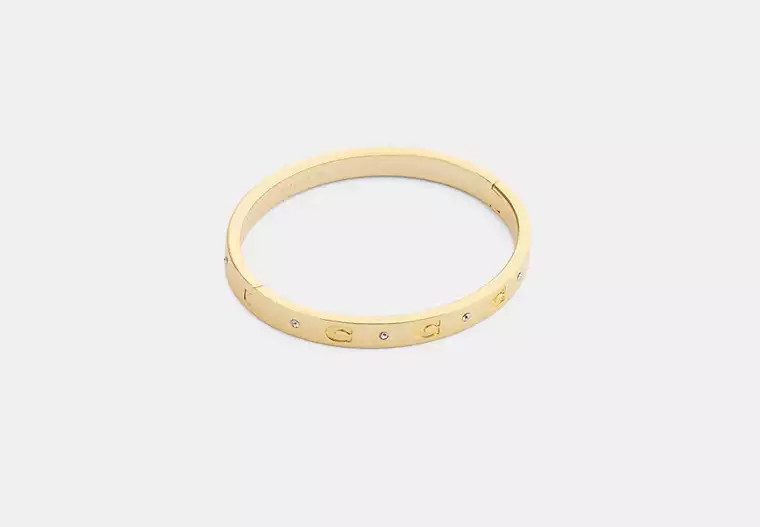 Repeated C Hinged Bangle | Jewelry | Coach | COACH® | Coach (US)