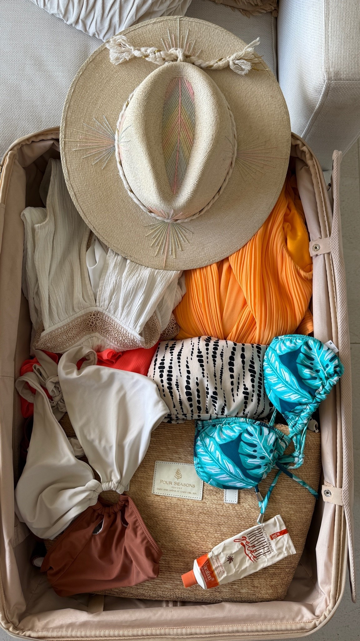 Packing for our wedding anniversary getaway at Four Seasons Resort Cabo Del Sol ✨

Think elevated resort wear, neutral swimwear, a statement hat, and a few pops of color for golden hour dinners overlooking the Sea of Cortez.

These are the pieces making it into my suitcase for a few days of pool time, spa appointments, anniversary dinners, and sunset cocktails in Cabo. ☀️🤍

Shop everything linked below — from my favorite resort-ready swimsuits to the accessories that come with me on almost every luxury beach vacation.

Luxury resort wear, Cabo vacation outfits, Four Seasons Cabo Del Sol, Beach vacation style, Neutral swimwear, White bikini, Brown bikini bottoms, Resort chic outfits, Vacation capsule wardrobe, Tropical vacation outfits, Luxury travel essentials, Beach hat, Wide brim hat, Pack with me, Vacation packing, Cabo packing list, Anniversary trip outfits, Summer resort fashion, Poolside style, Beach club outfit, Vacation accessories, Straw tote bag, Travel style, Mexico vacation outfits, Golden hour outfit, Orange vacation dress, White cover up, Crochet cover up, Luxury hotel style, Pool day essentials, Reef-safe sunscreen, Beach vacation must haves, Tropical getaway, Warm weather fashion, Vacation wardrobe, Coastal chic style, Resort wear for women, Luxury travel creator, Los Cabos travel, Four Seasons style, Luxury beach vacation, Luxury resort vacation, Cabo San Lucas, Los Cabos Mexico, Beachwear essentials, Vacation outfit inspiration, Travel fashion, Poolside fashion, Luxury travel blogger, Destination anniversary trip, Romantic getaway style, Luxury hotel getaway, Resort fashion inspiration, Carry-on packing, Vacation packing essentials, Summer travel outfits, Beach resort 
style.

#LTKTravel #LTKWedding #LTKSwim
