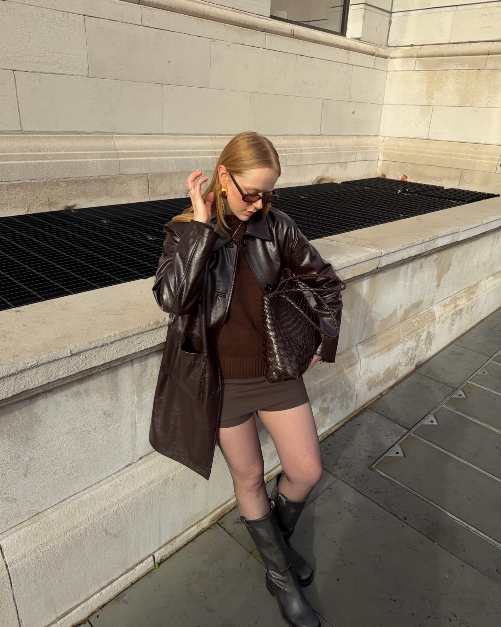 Patent Jacket, Leather Jacket, Trench Coat, Brown Jumper, Skort, Knee High Boots 

#LTKuk #LTKautumn