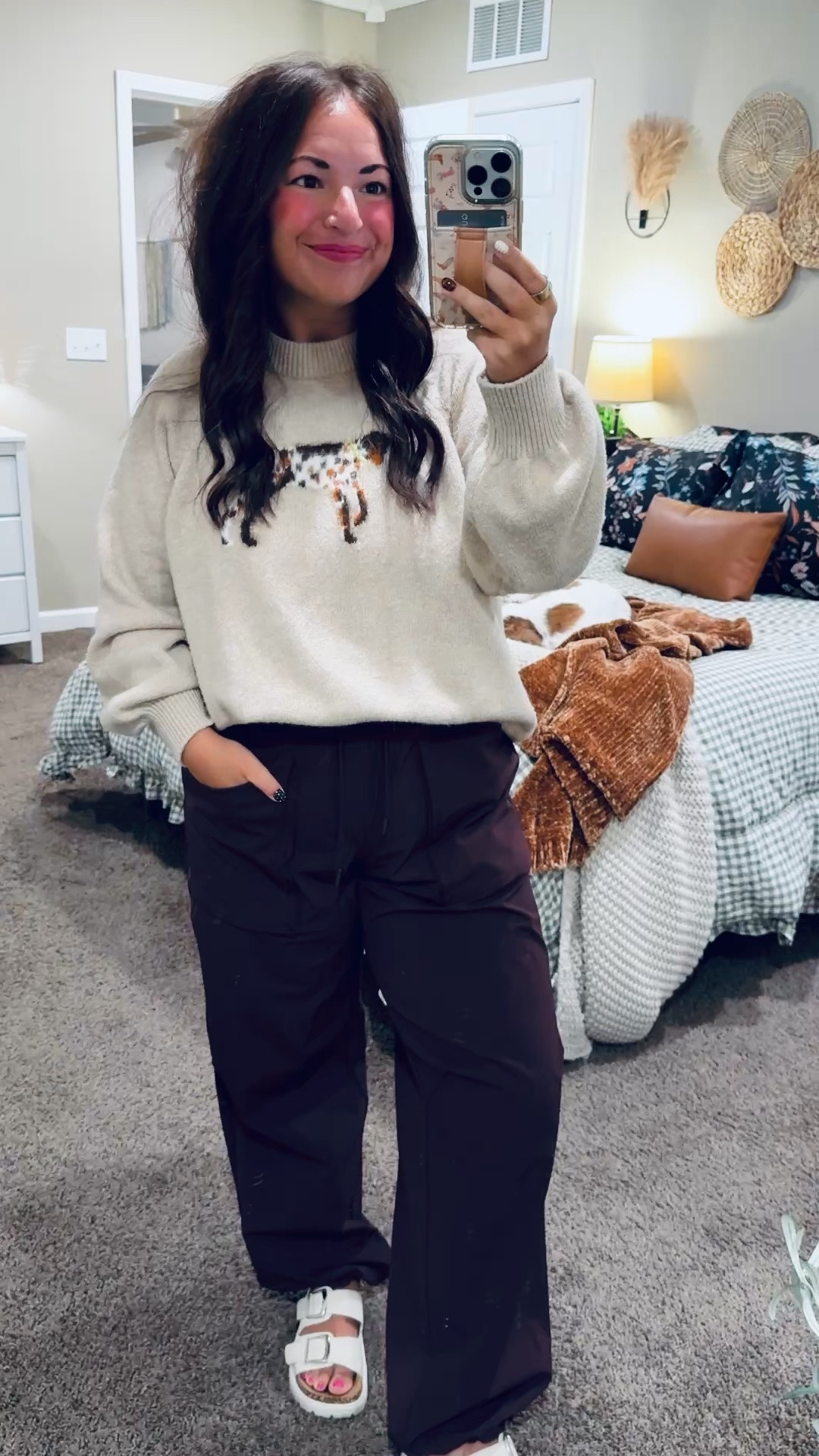 Dog moms, this sweater is too cute! 🐶🤎 Loving the little pup detail & cozy relaxed fit. Paired with black pants for a comfy classroom look with a little personality!

sandals: sold out, but linking similar options below!
pants: oversized // wearing a medium
sweater: fits oversized // wearing a medium 

 #LTKootd #LTKMidsize #LTKWorkwear