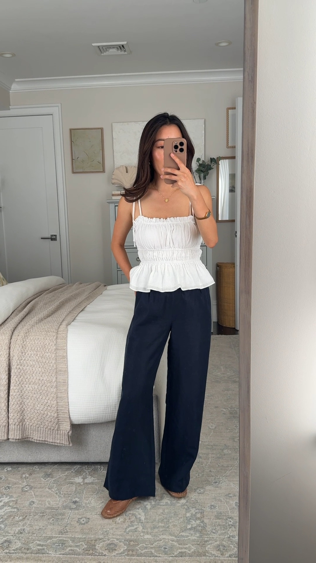 Yet another way to style this top! • linen blend pull on pants 2XS Short . The inseam on my pair measures~ 27.75." Linen length will shrink a little in machine dryer, so be sure to air dry if you dont want that.
- linen cami. I could potentially do Xs. 
- Amazon mesh flats work with insoles since the flats don’t have much cushioning 

summer 2026 outfit ideas , linen pants , petite style, navy look

#LTKootd #LTKPetite #LTKTravel