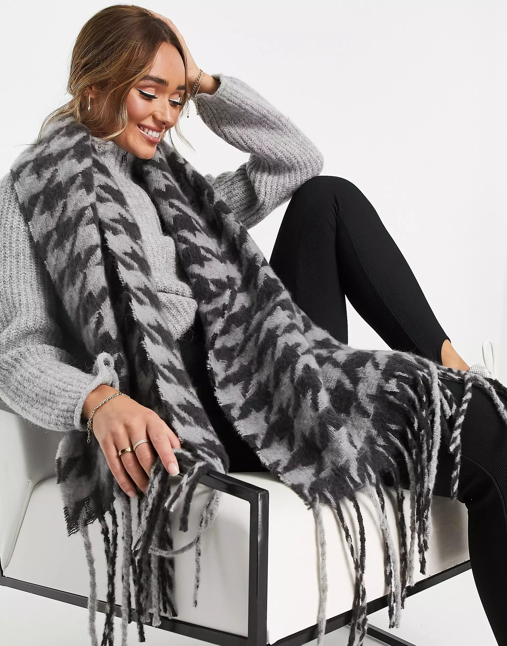 ASOS DESIGN fluffy dogtooth scarf with tassels in gray | ASOS (Global)
